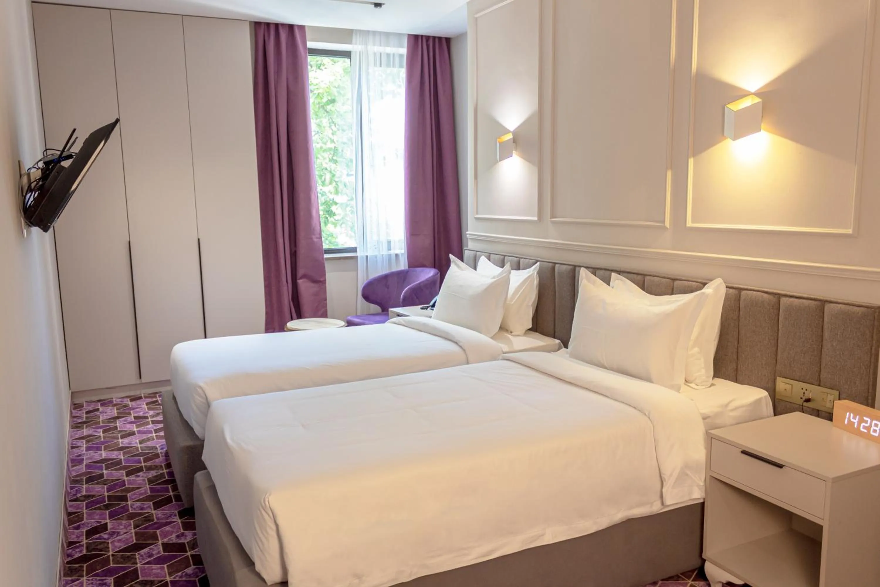 Photo of the whole room, Bed in Orient Hotel Bishkek