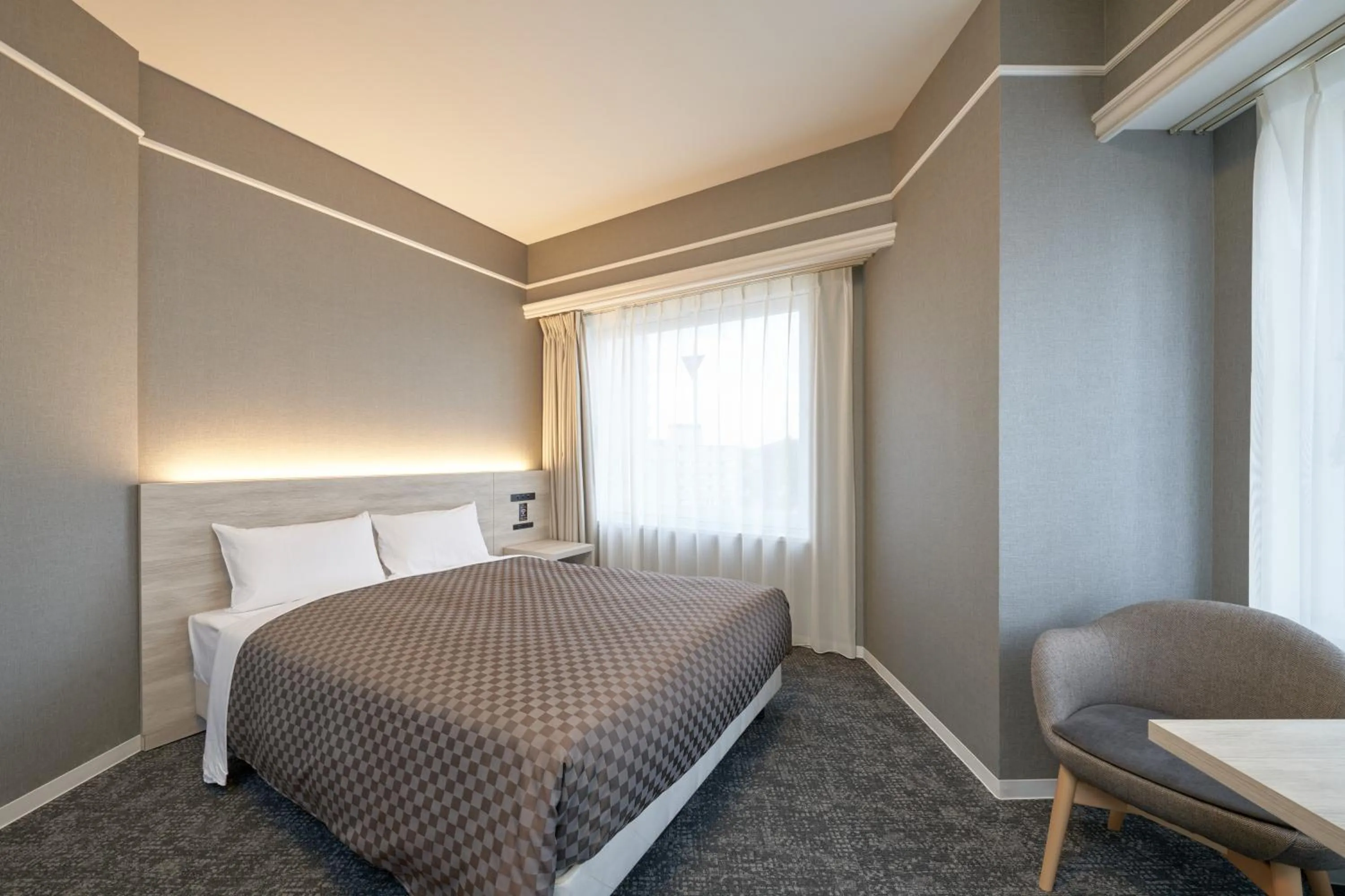 Photo of the whole room, Bed in The OneFive Garden Kurashiki