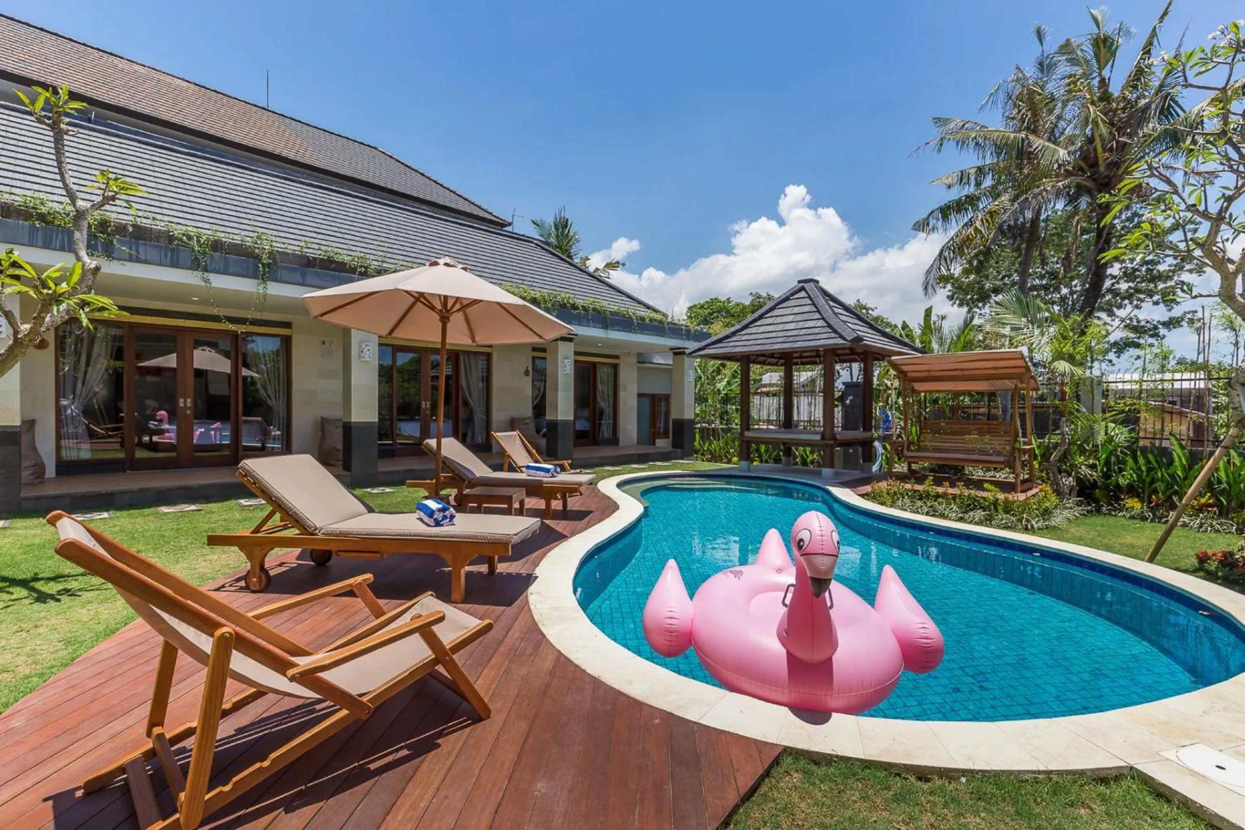 Swimming pool in Ayuna Suites Canggu