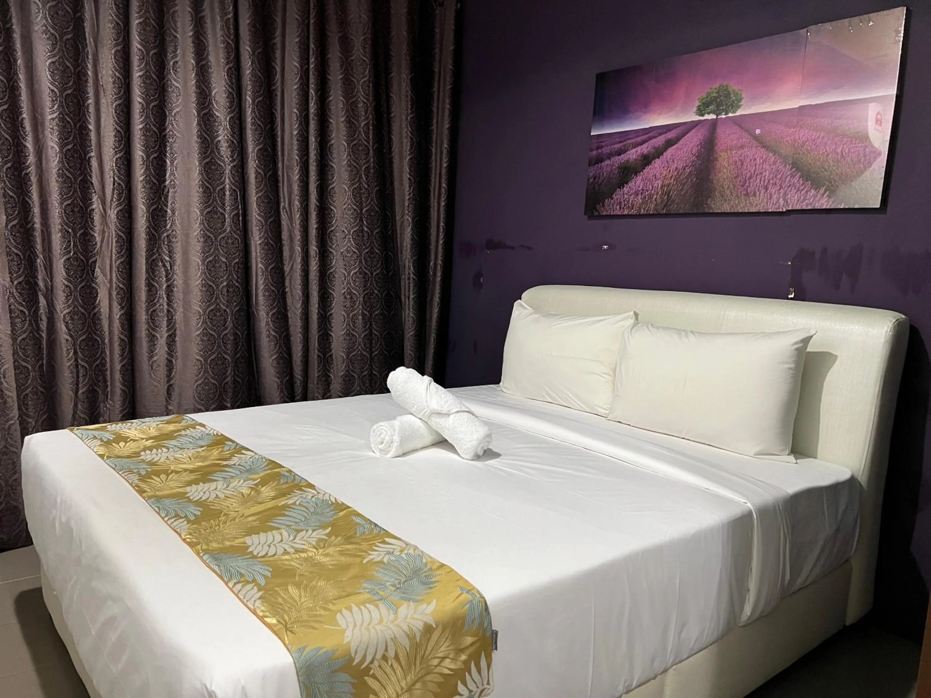 Bed in Cassia Inn Kuching
