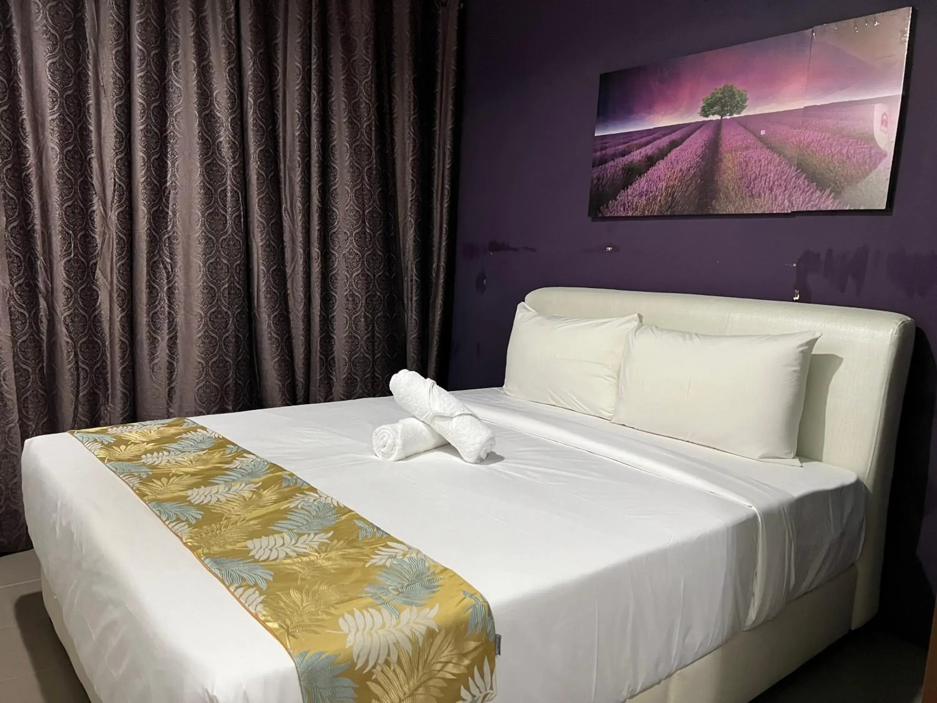 Bed in Cassia Inn Kuching Bed in Cassia Inn Kuching