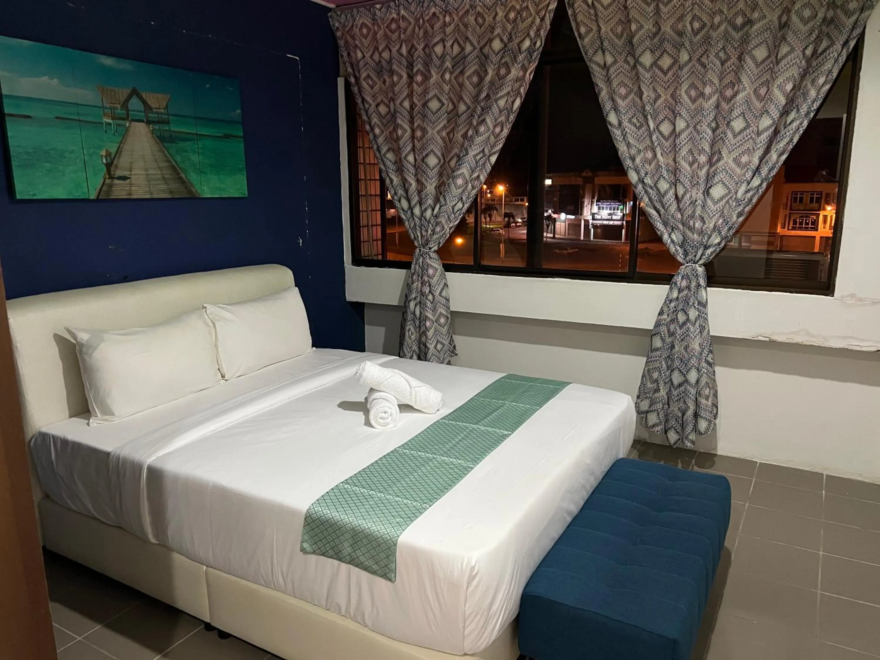 Bed in Cassia Inn Kuching
