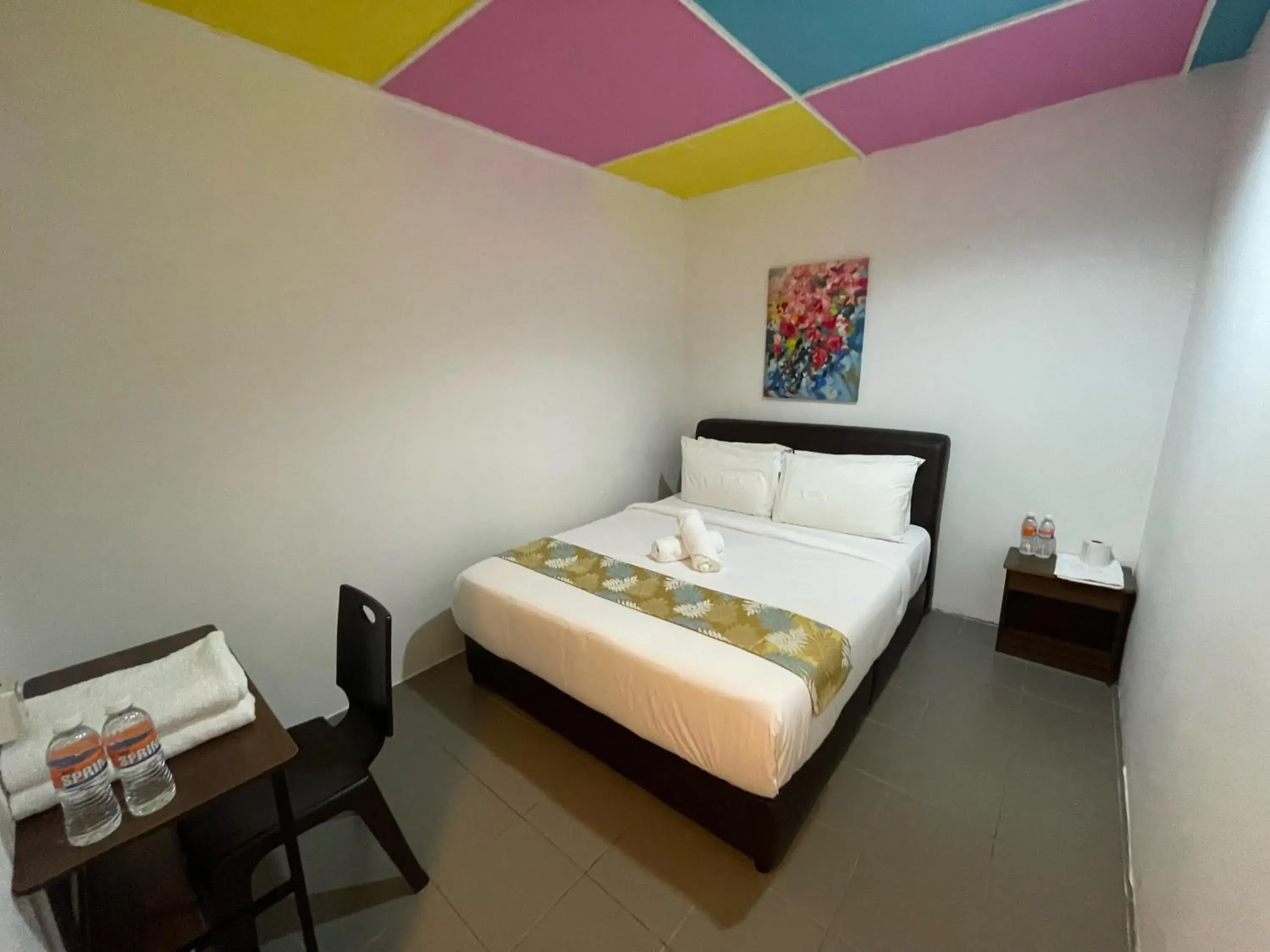 Bed in Cassia Inn Kuching Bed in Cassia Inn Kuching