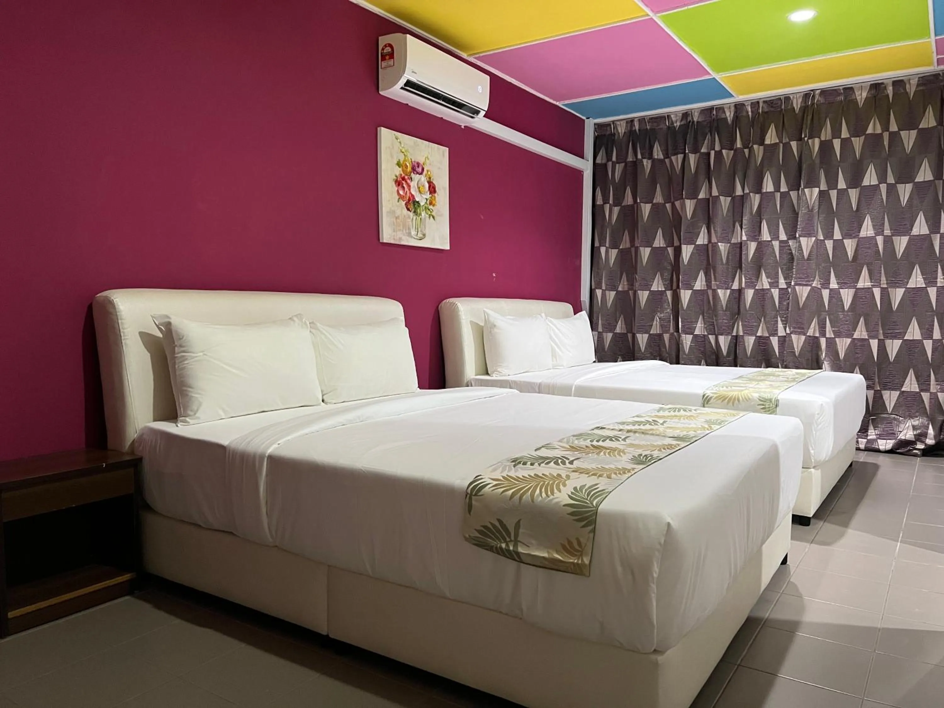 Bed in Cassia Inn Kuching