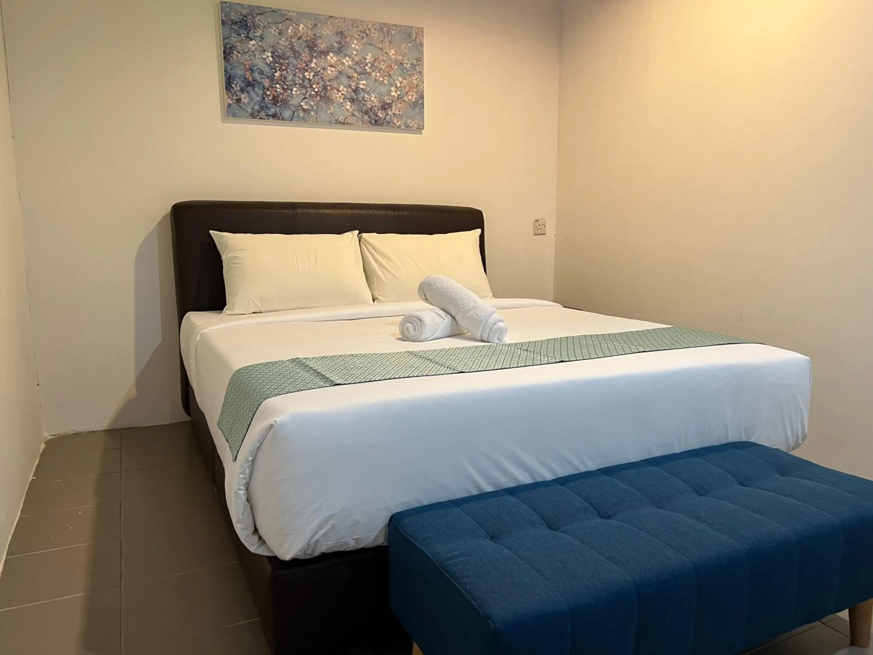 Bed in Cassia Inn Kuching