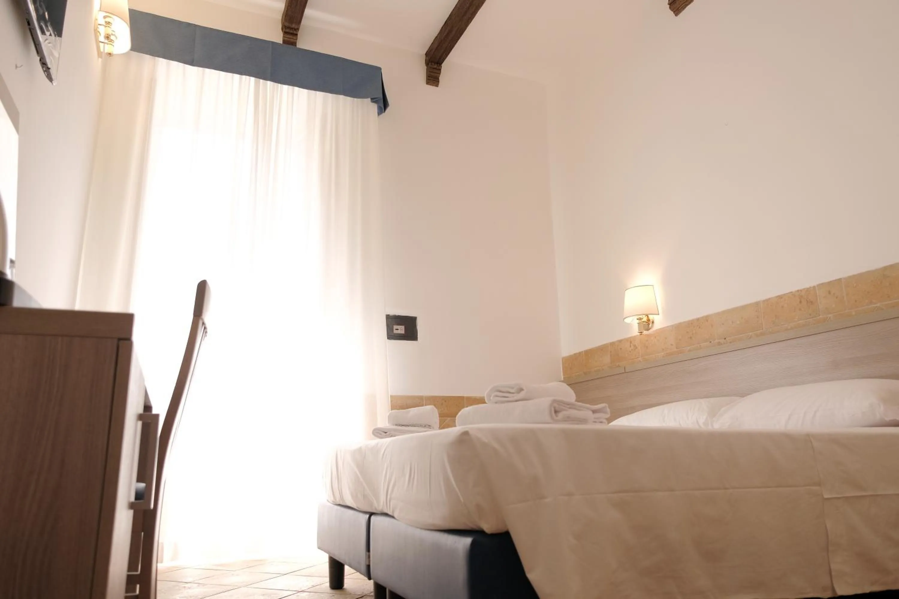 Bed in Hotel Alex Square