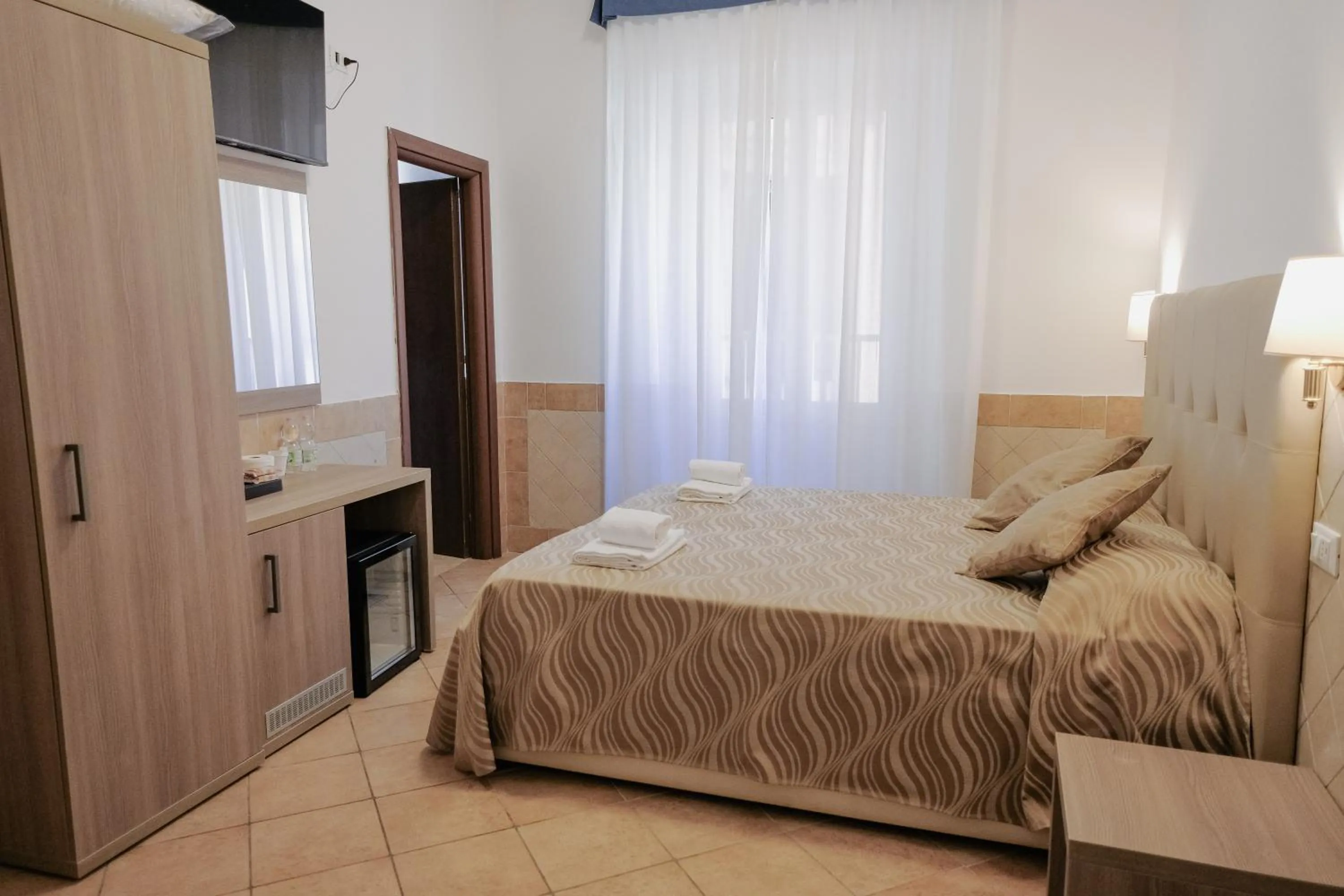 Bed in Hotel Alex Square