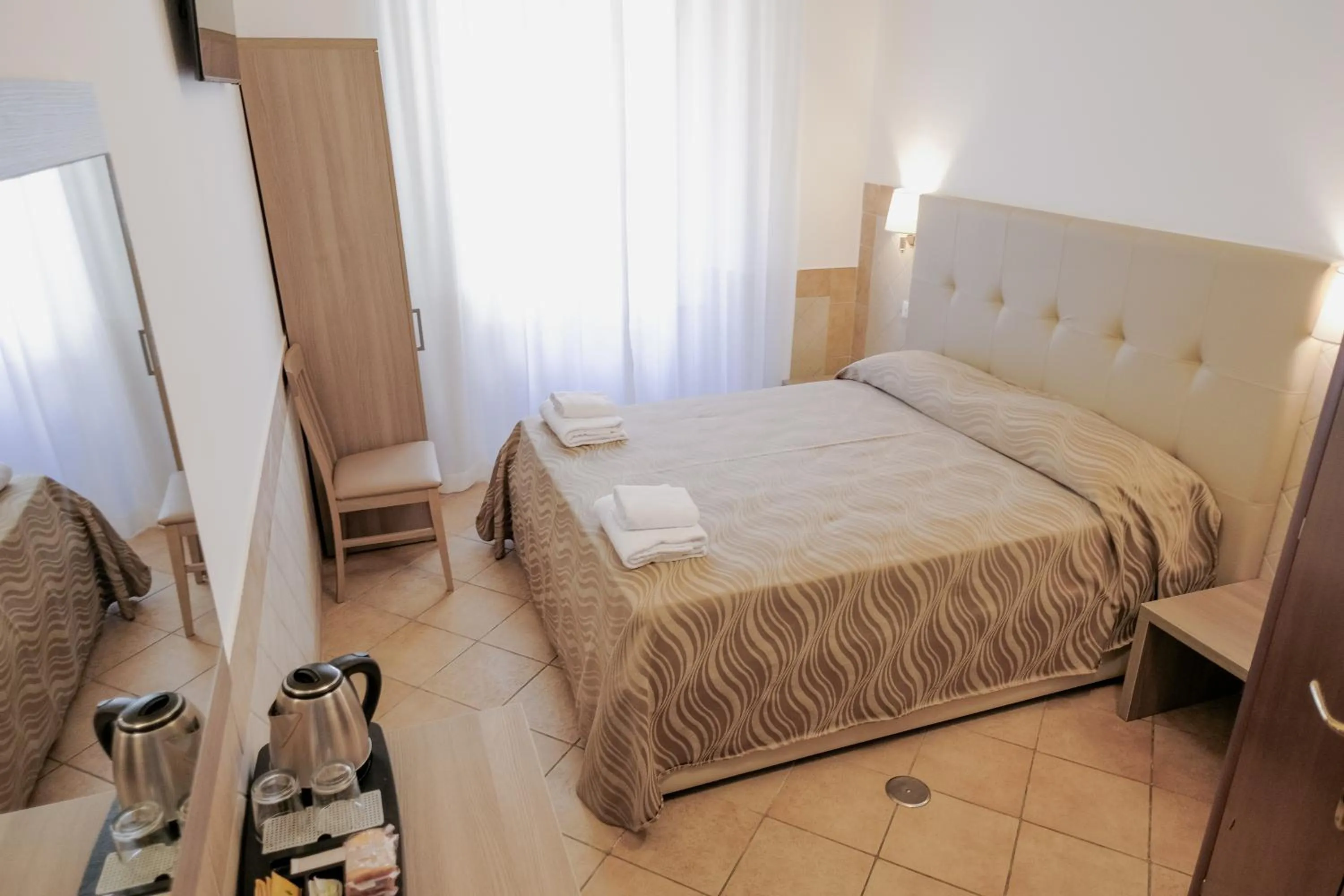 Bed in Hotel Alex Square