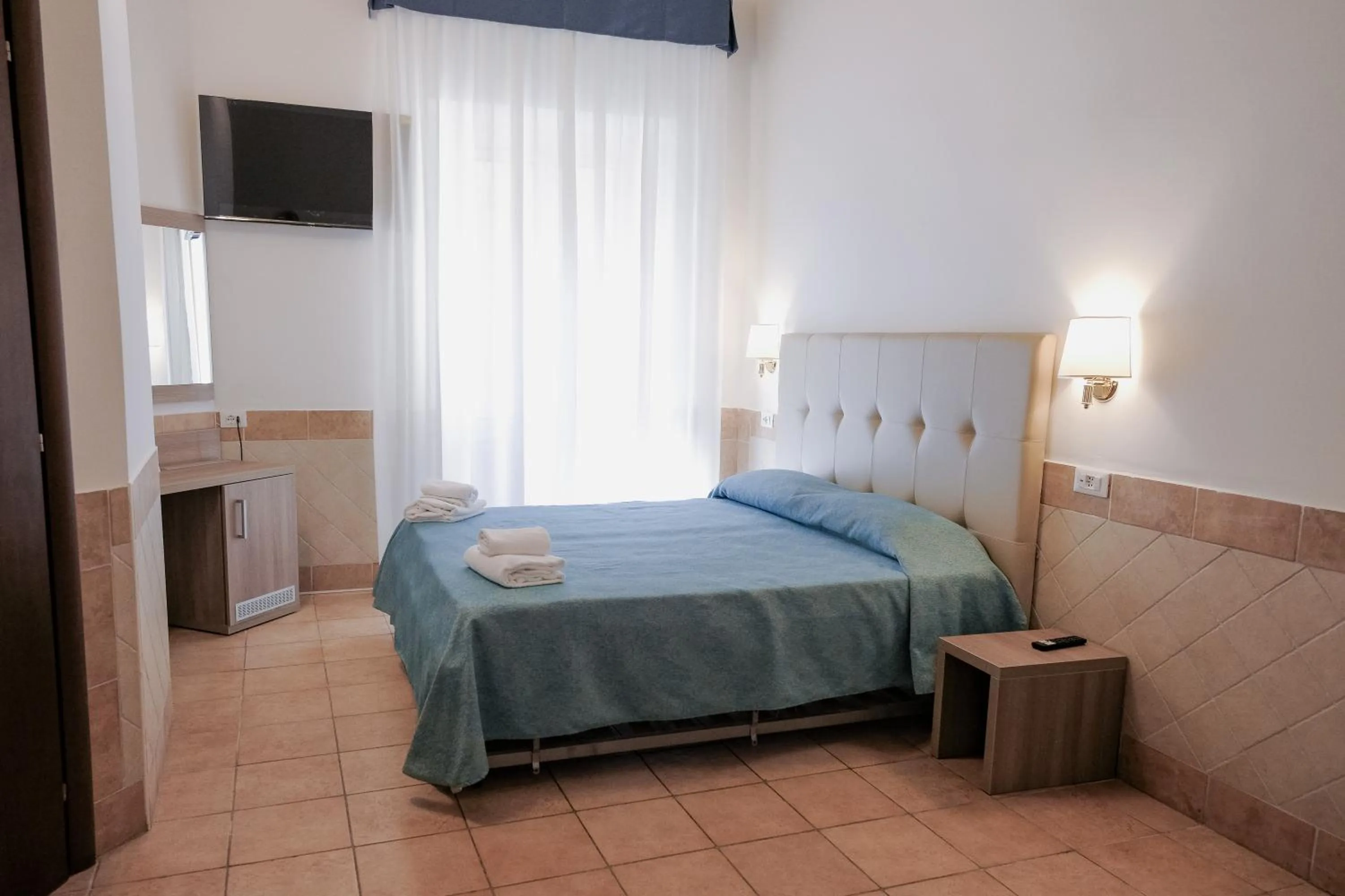 Bed in Hotel Alex Square