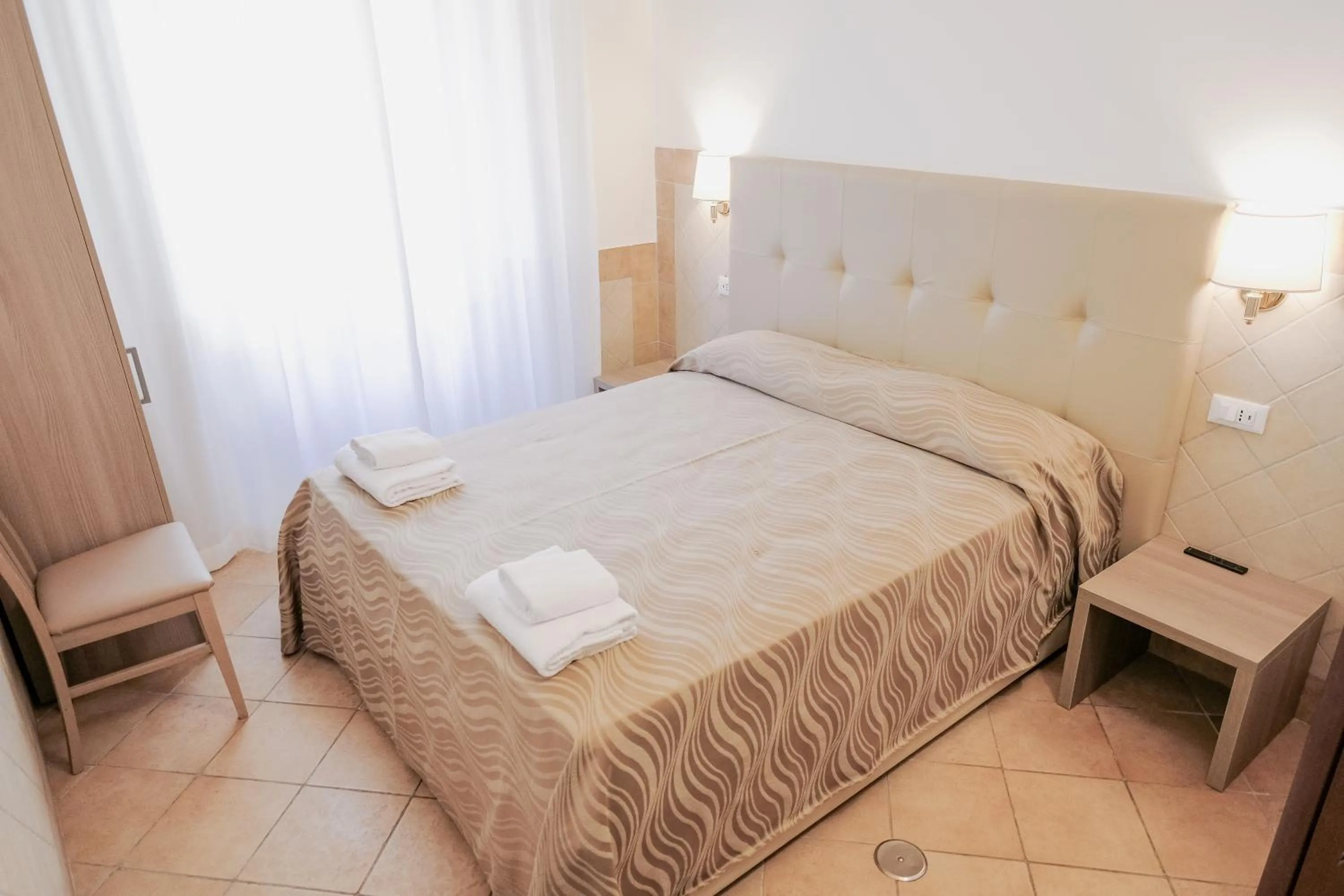 Bed in Hotel Alex Square