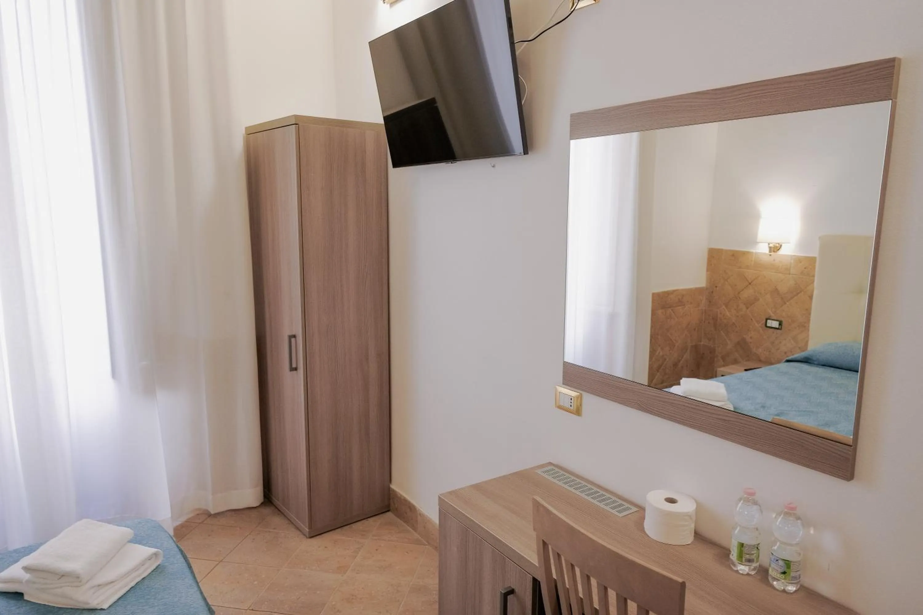 Bed in Hotel Alex Square