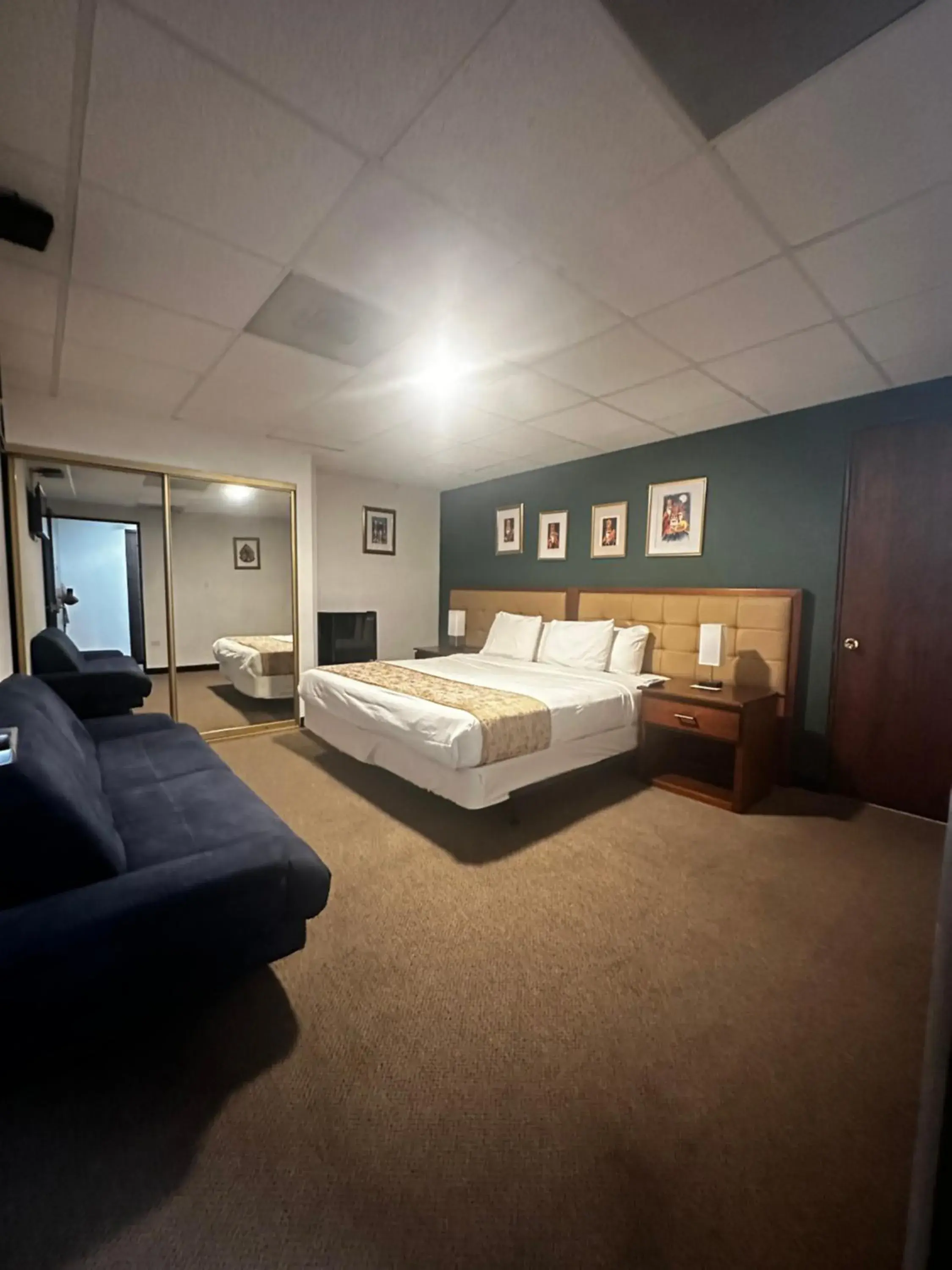 Bed in SJ SUITES HOTEL Bed in SJ SUITES HOTEL