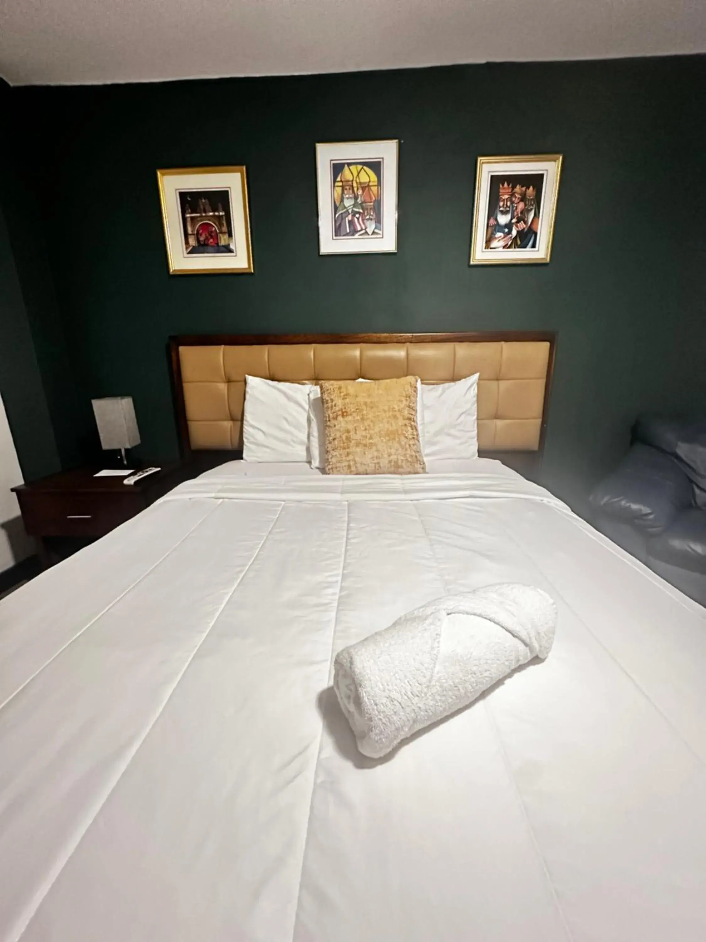 Bed in SJ SUITES HOTEL Bed in SJ SUITES HOTEL