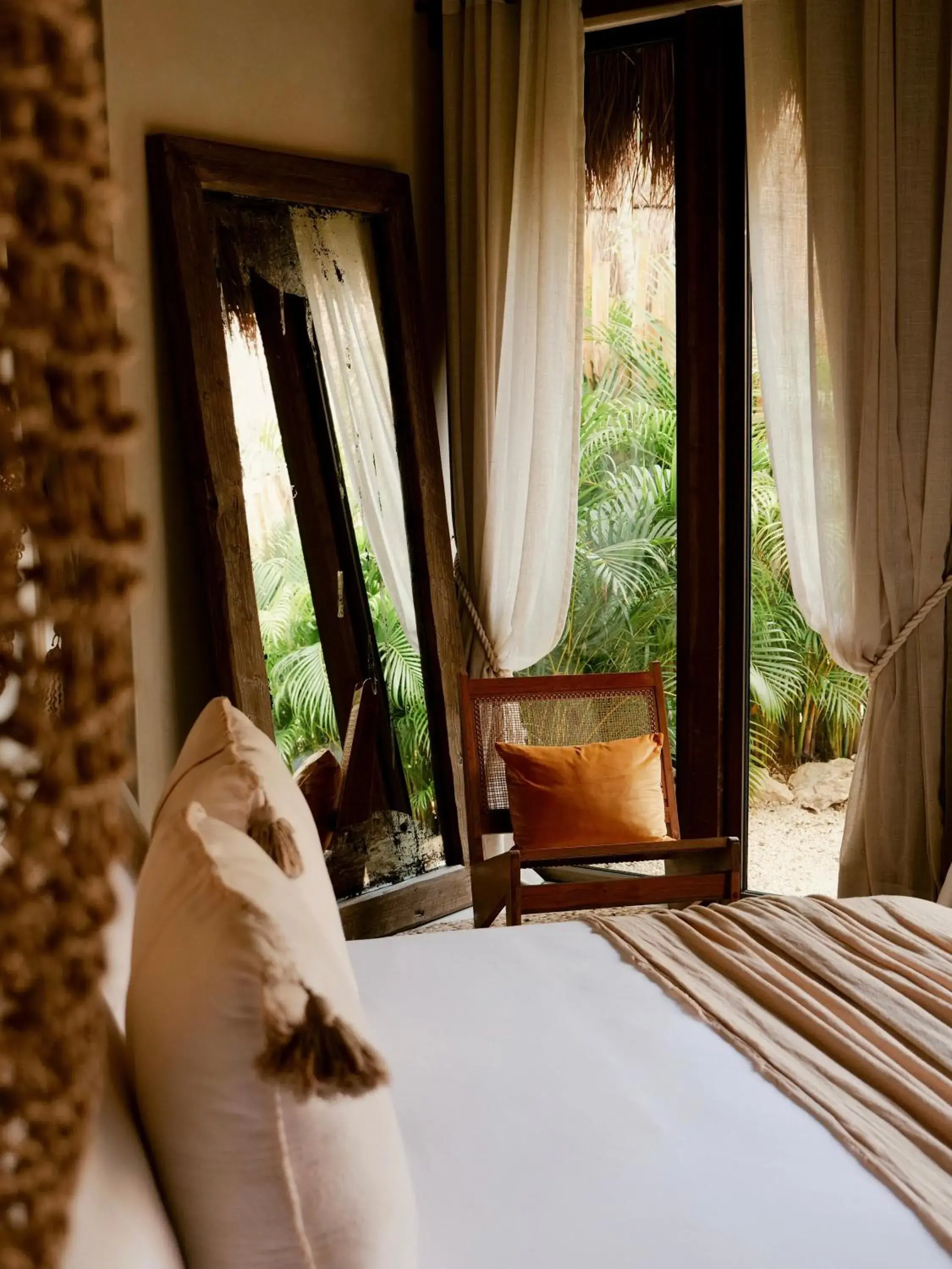 Bed in Hotel Muaré Tulum Wellness and Spa Bed in Hotel Muaré Tulum Wellness and Spa