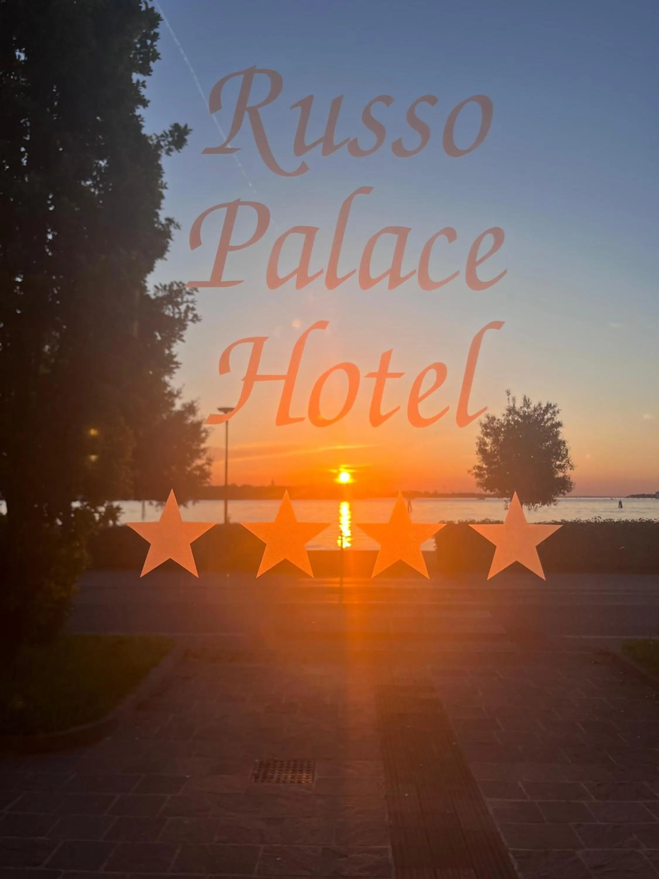 Property logo or sign in Hotel Russo Palace