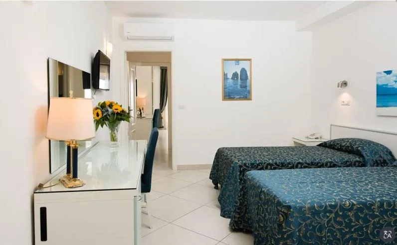 Bed in Hotel Weber Ambassador