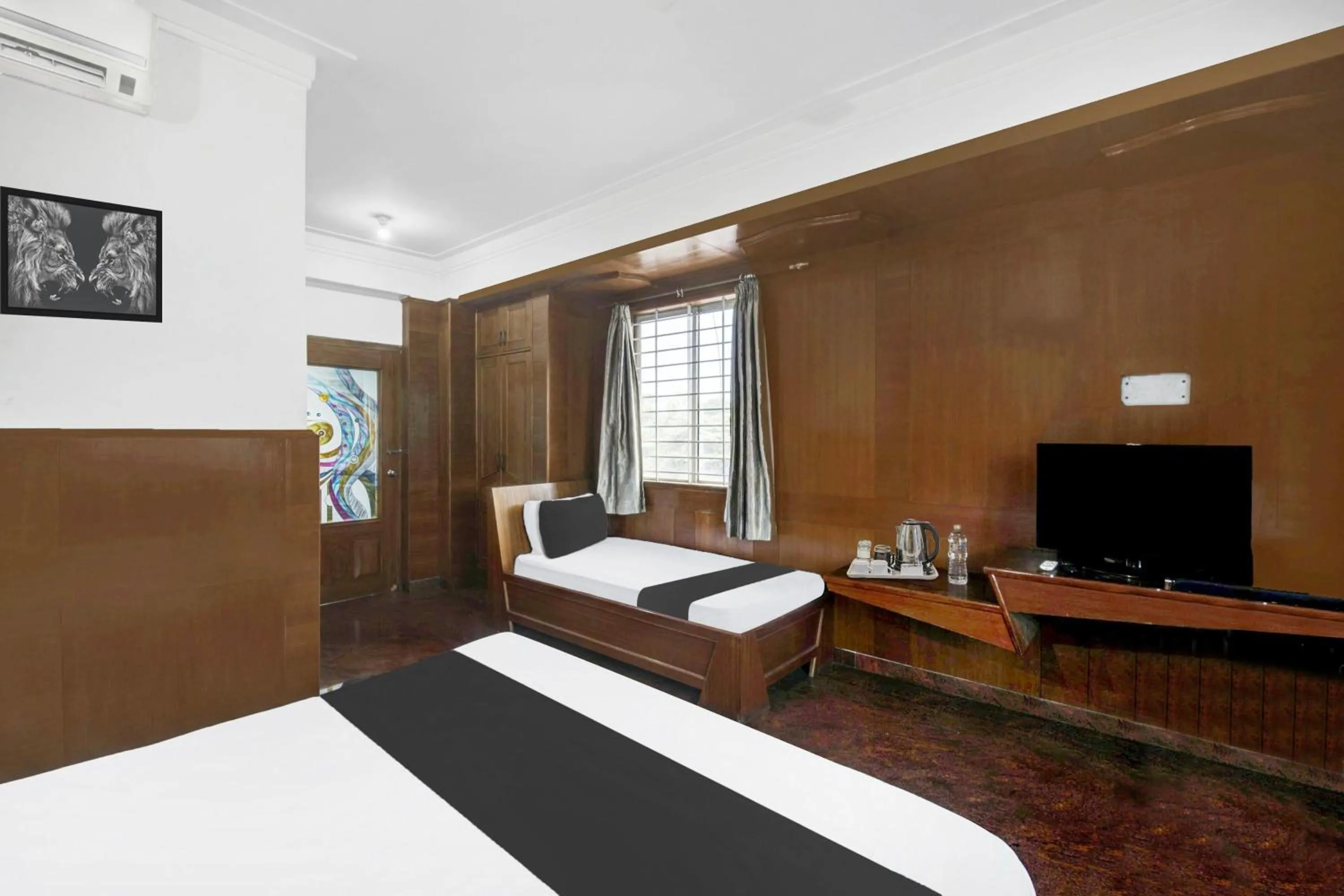 Bedroom, Bed in Super Townhouse Mysore City Centre Formerly Hotel Mahendra
