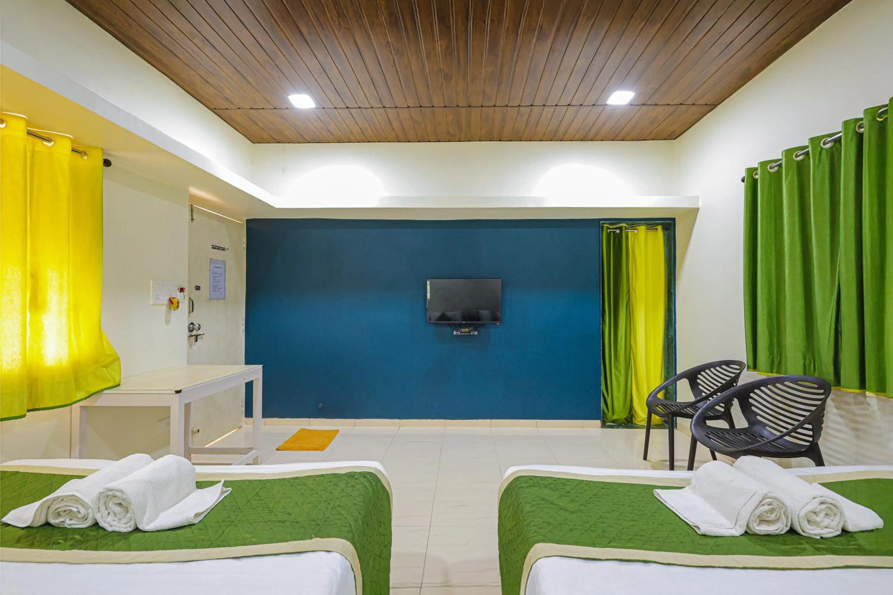TV and multimedia, Bed in Kokanwadi Resort