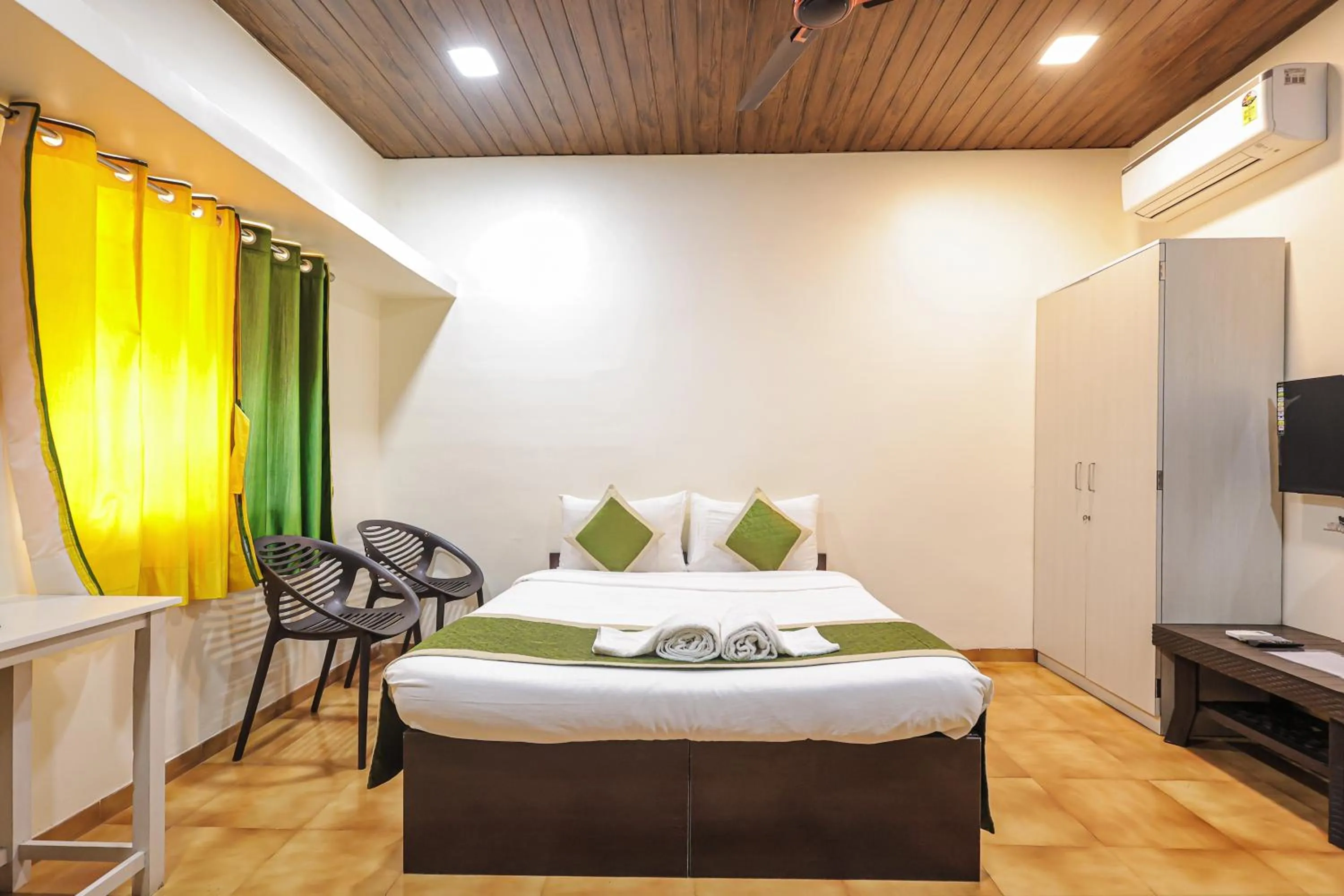 Bed in Kokanwadi Resort