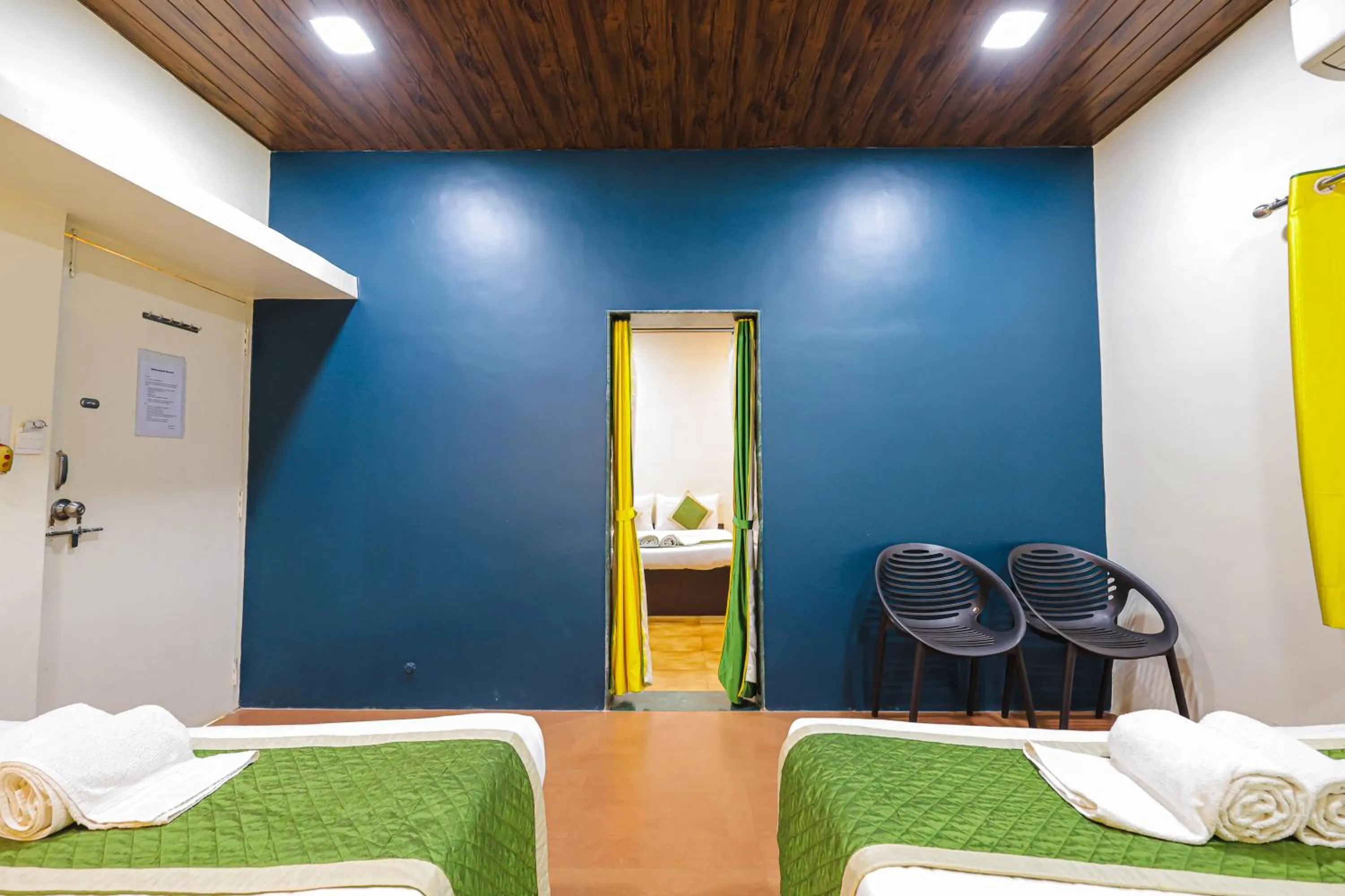 Bed in Kokanwadi Resort