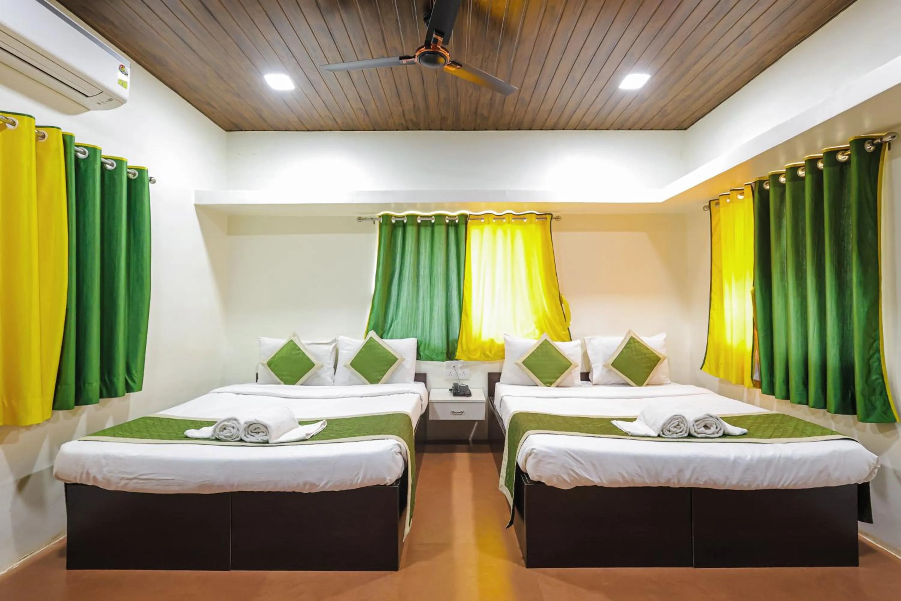Bed in Kokanwadi Resort