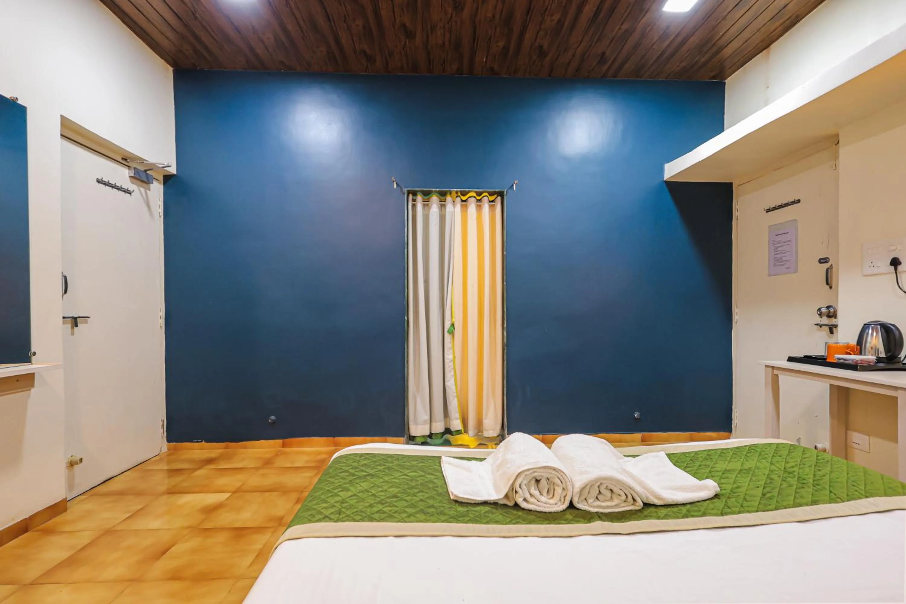 Bed in Kokanwadi Resort