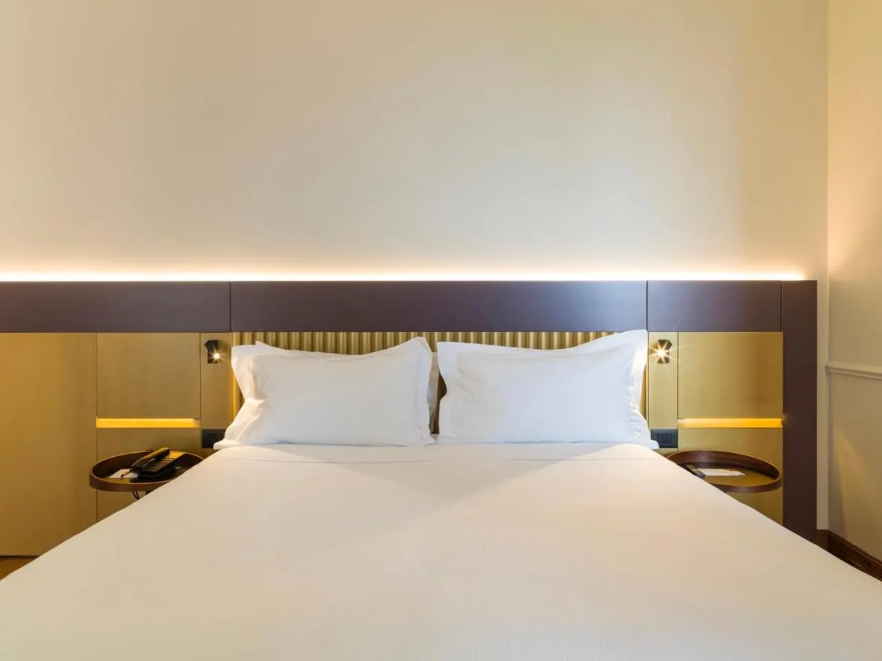 Bed in UNA Hotels One Catania