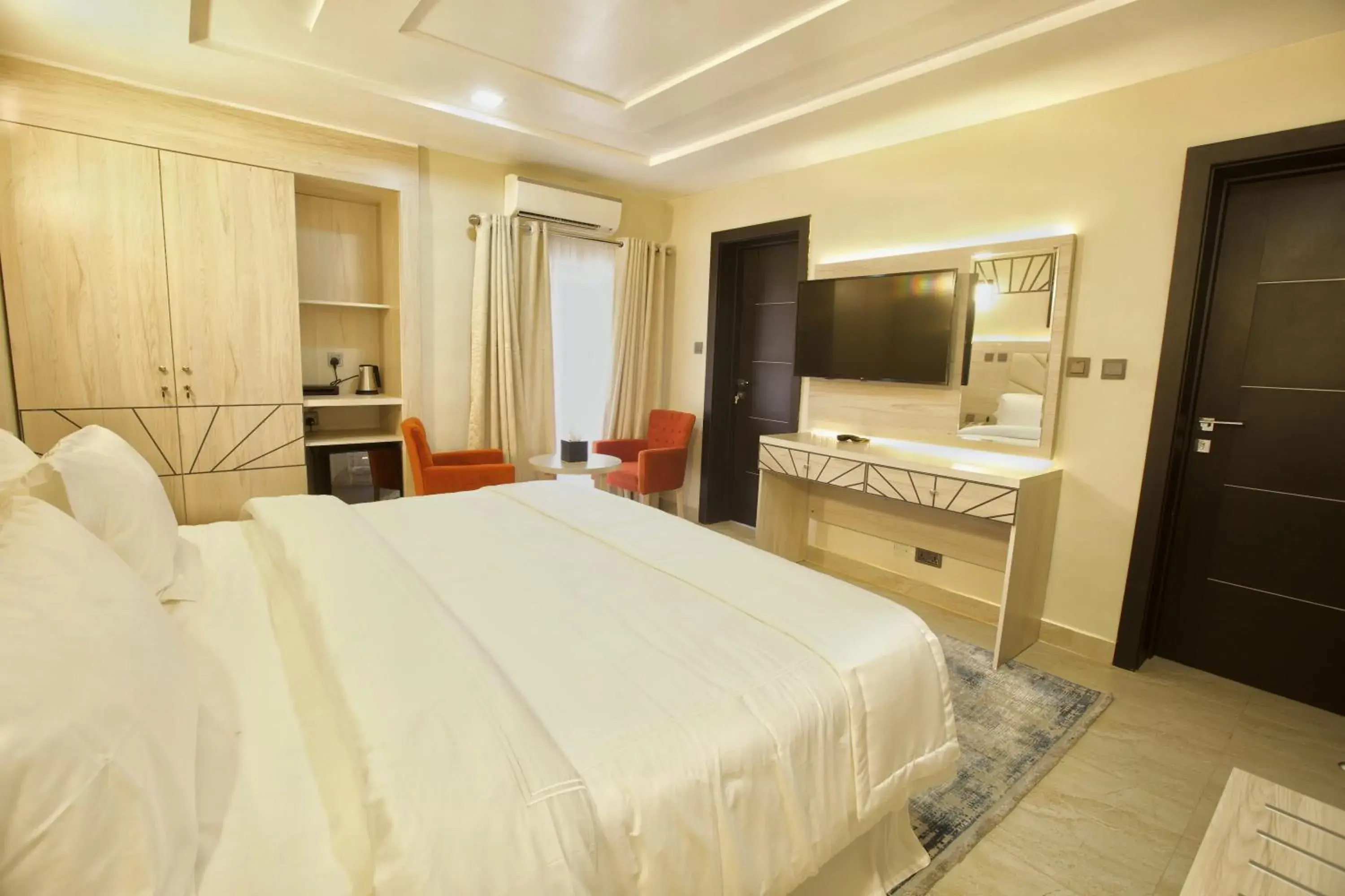 TV and multimedia, Bed in Musada Luxury Hotels and Suites TV and multimedia, Bed in Musada Luxury Hotels and Suites