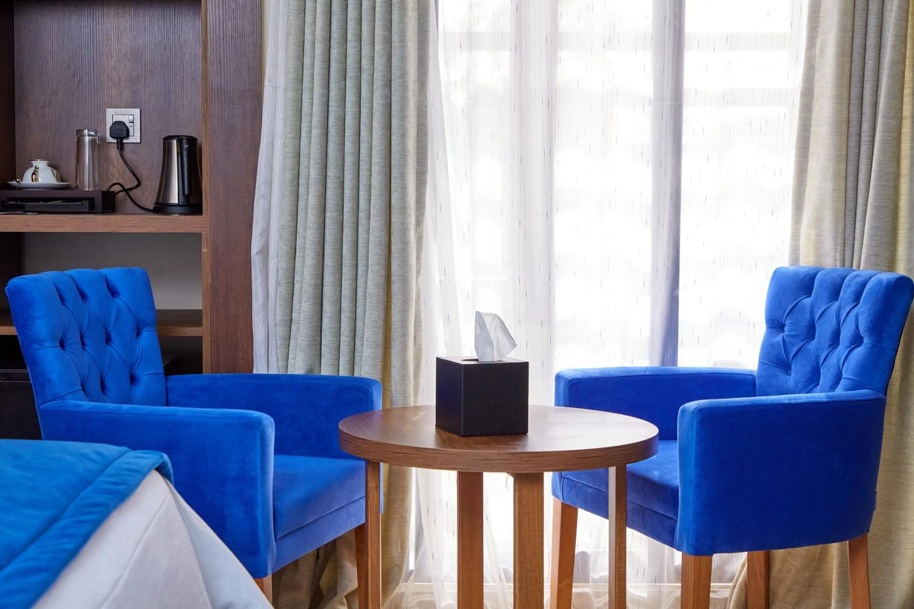 Seating area in Musada Luxury Hotels and Suites