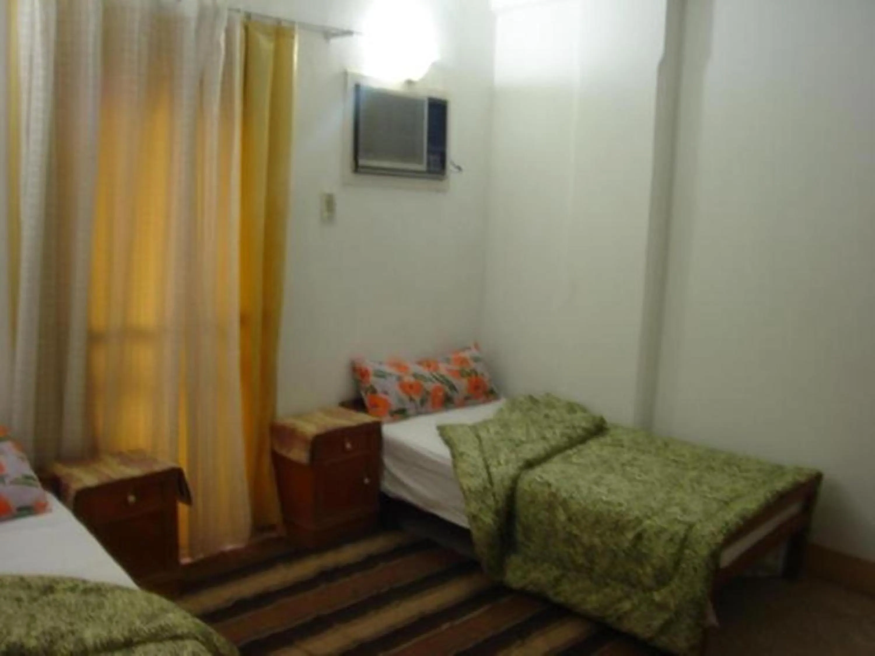 Bed in Rose Guest House