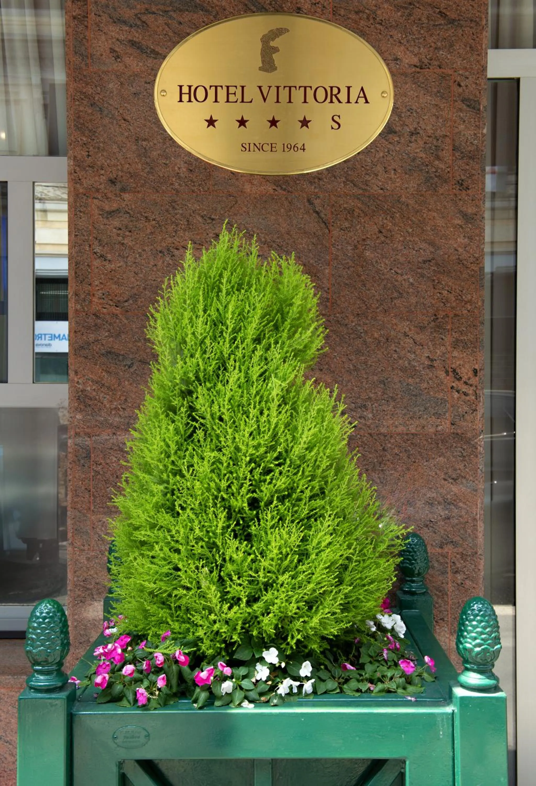 Property logo or sign in Hotel Vittoria