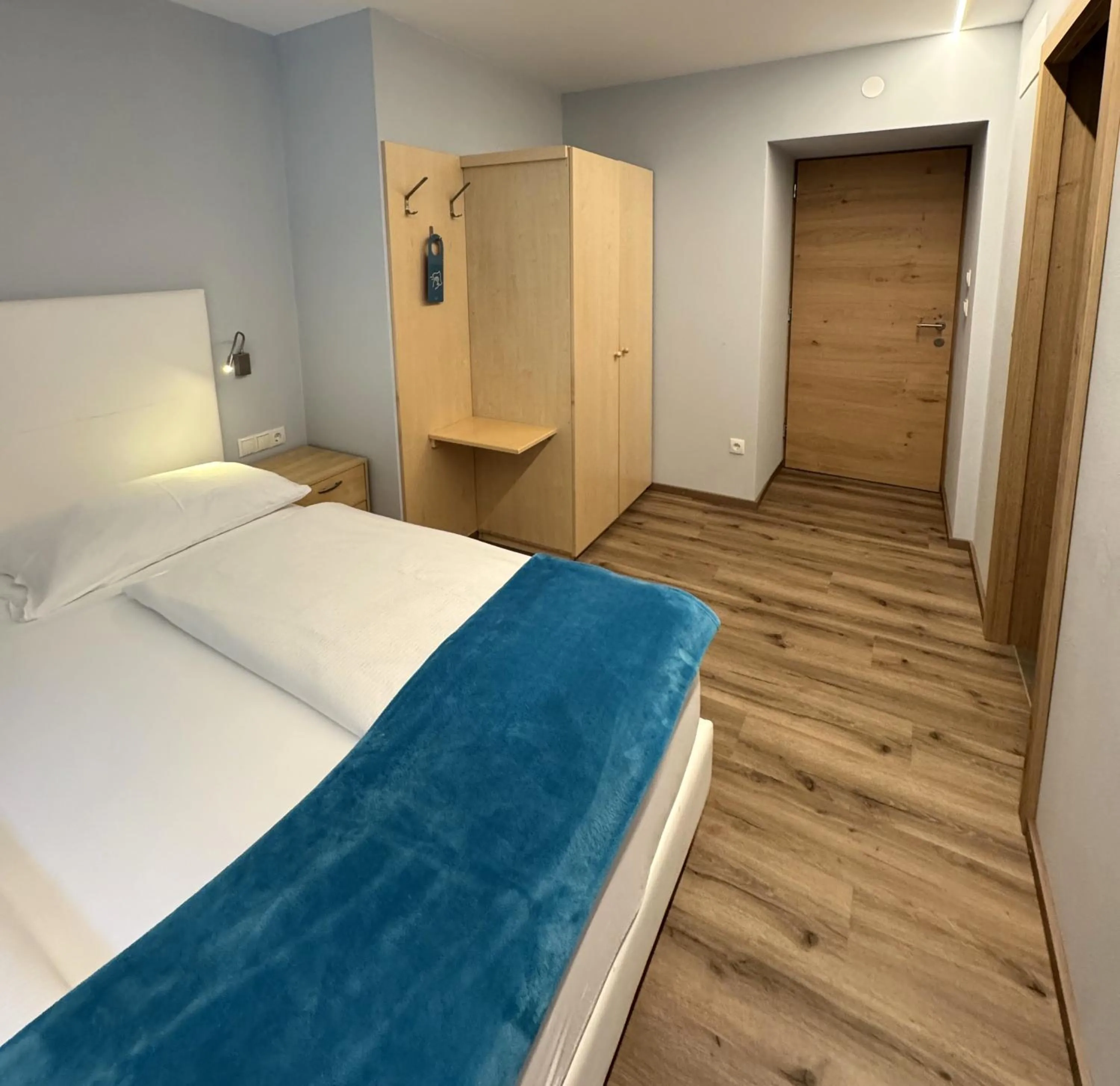 Bed in Glacier Rock guesthouse ex Pension Dangl