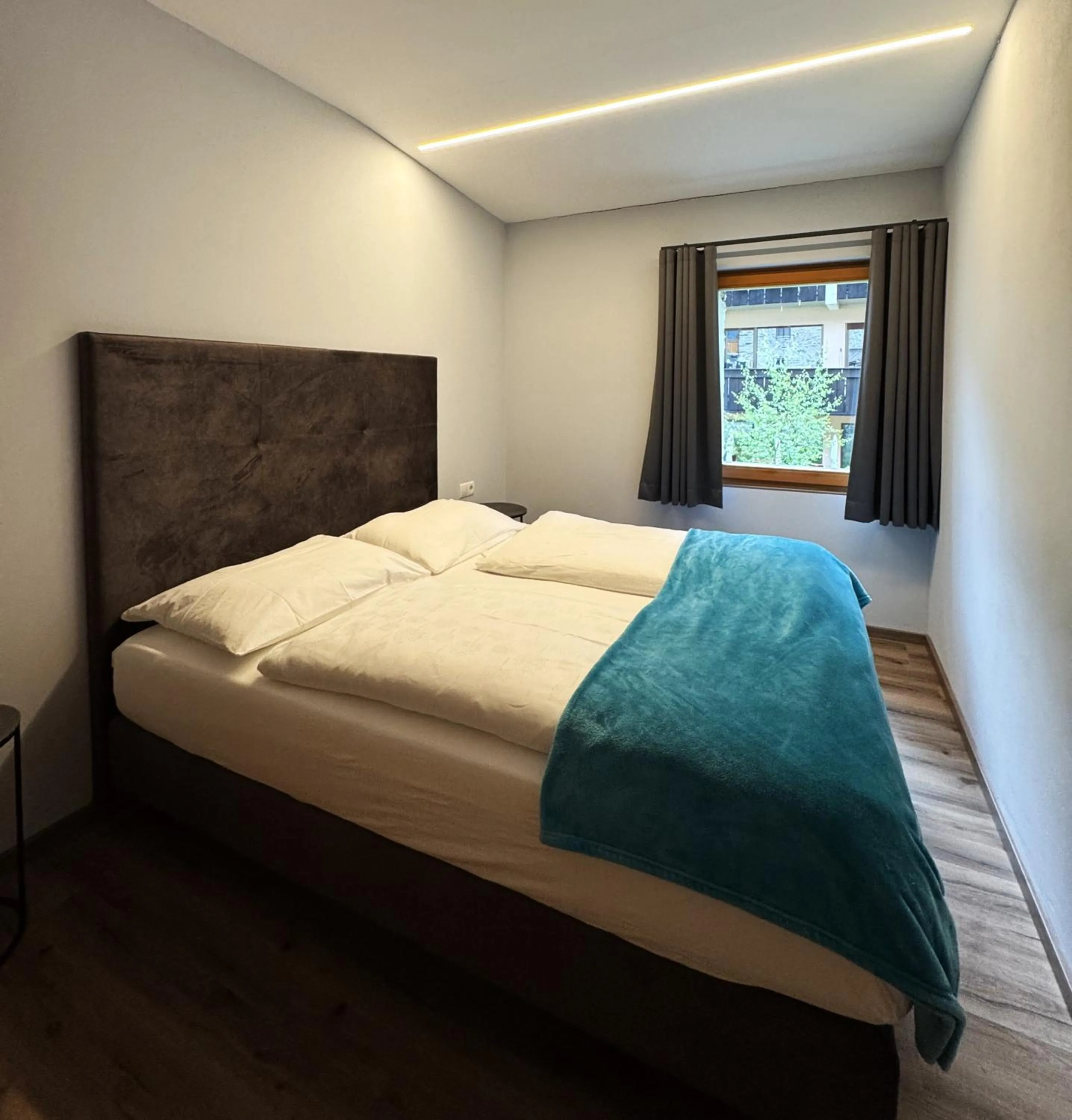 Bed in Glacier Rock guesthouse ex Pension Dangl