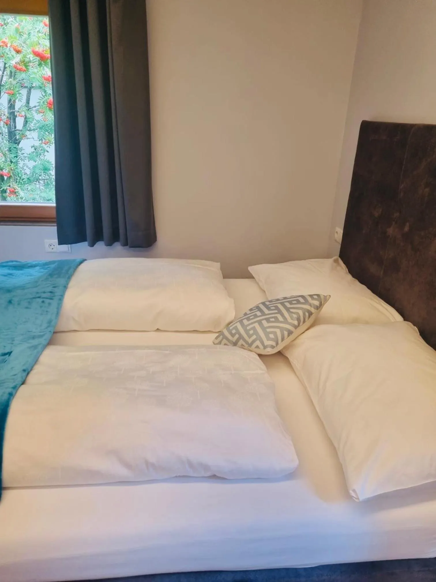 Bed in Glacier Rock guesthouse ex Pension Dangl