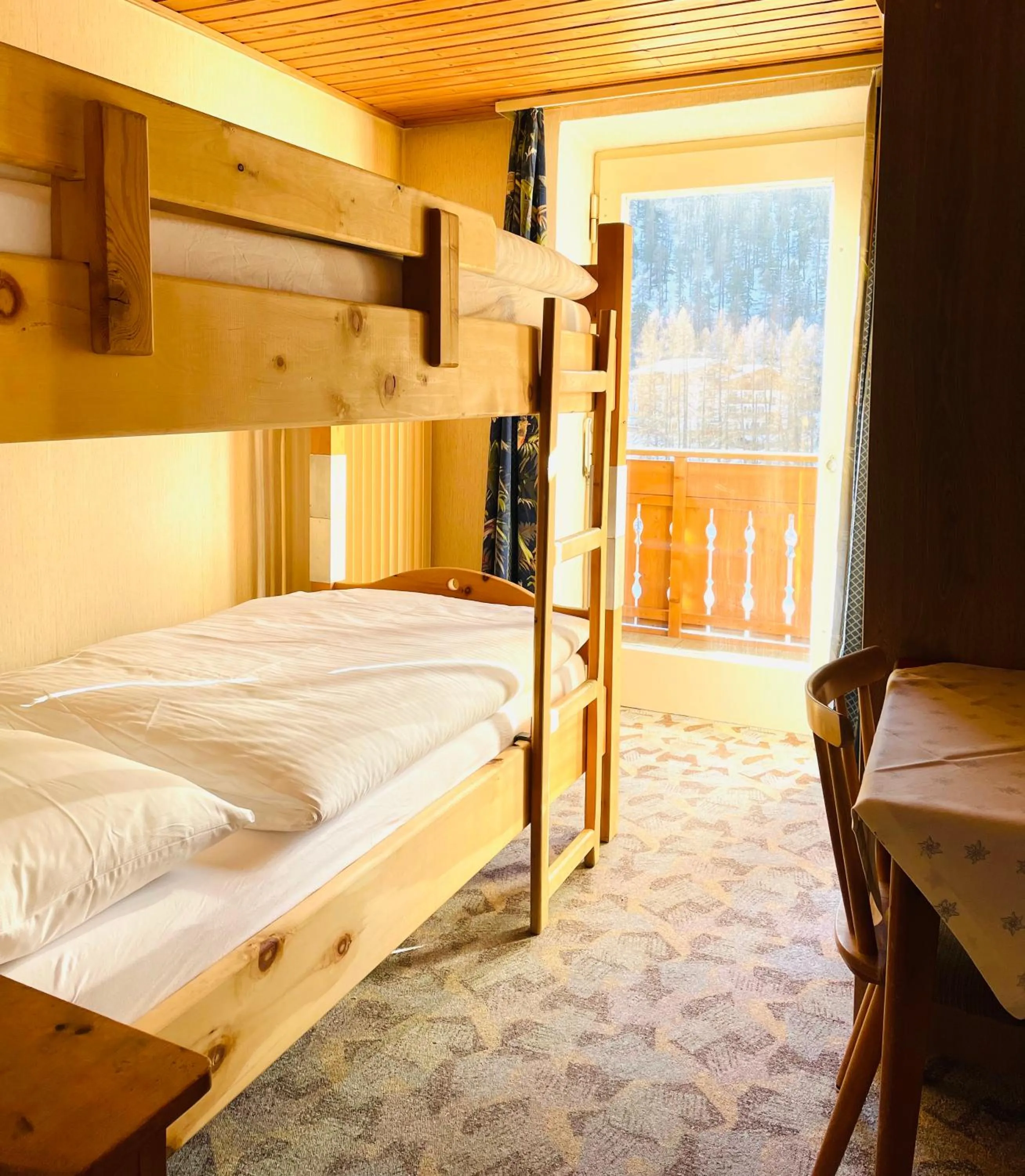 Bed in Glacier Rock guesthouse ex Pension Dangl