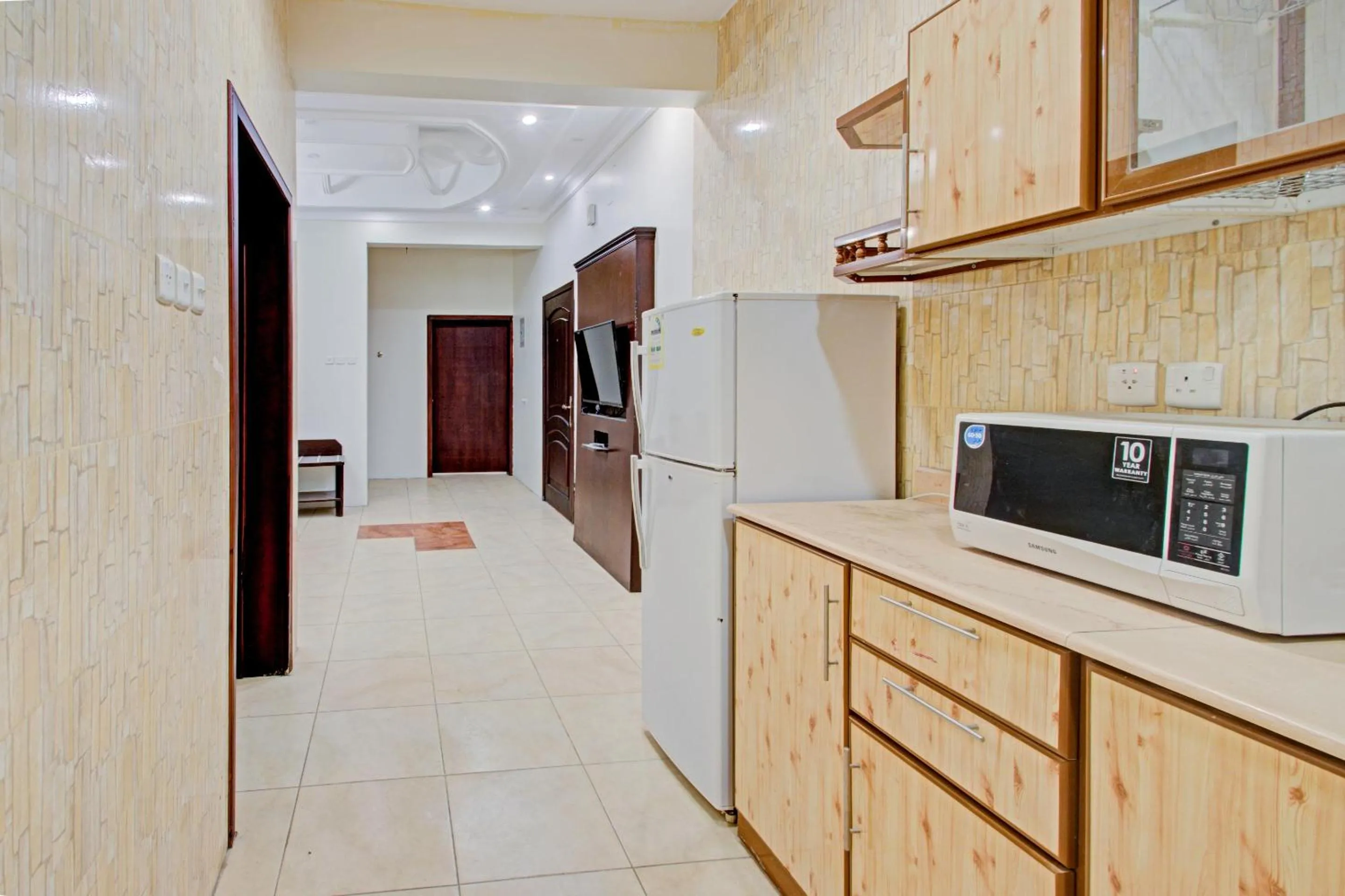 Kitchen or kitchenette, Kitchen/Kitchenette in OYO 601 Ibs For Residential Units
