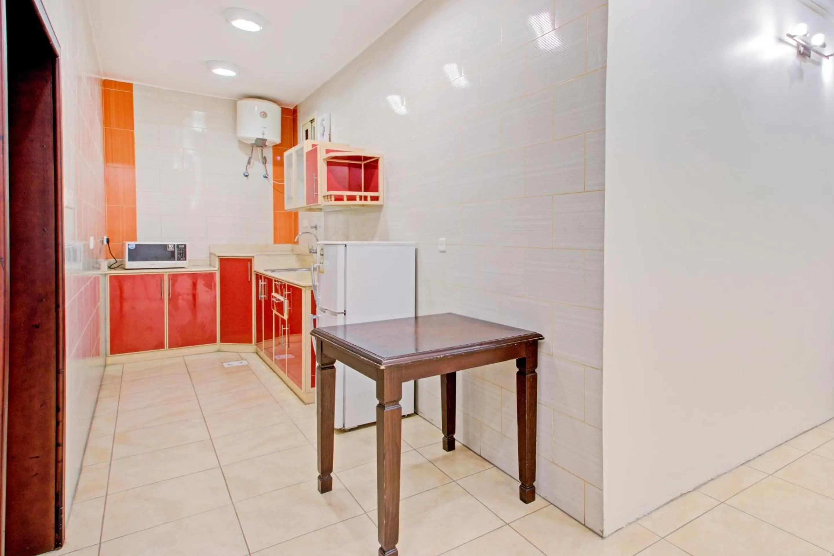 Kitchen or kitchenette, Kitchen/Kitchenette in OYO 601 Ibs For Residential Units