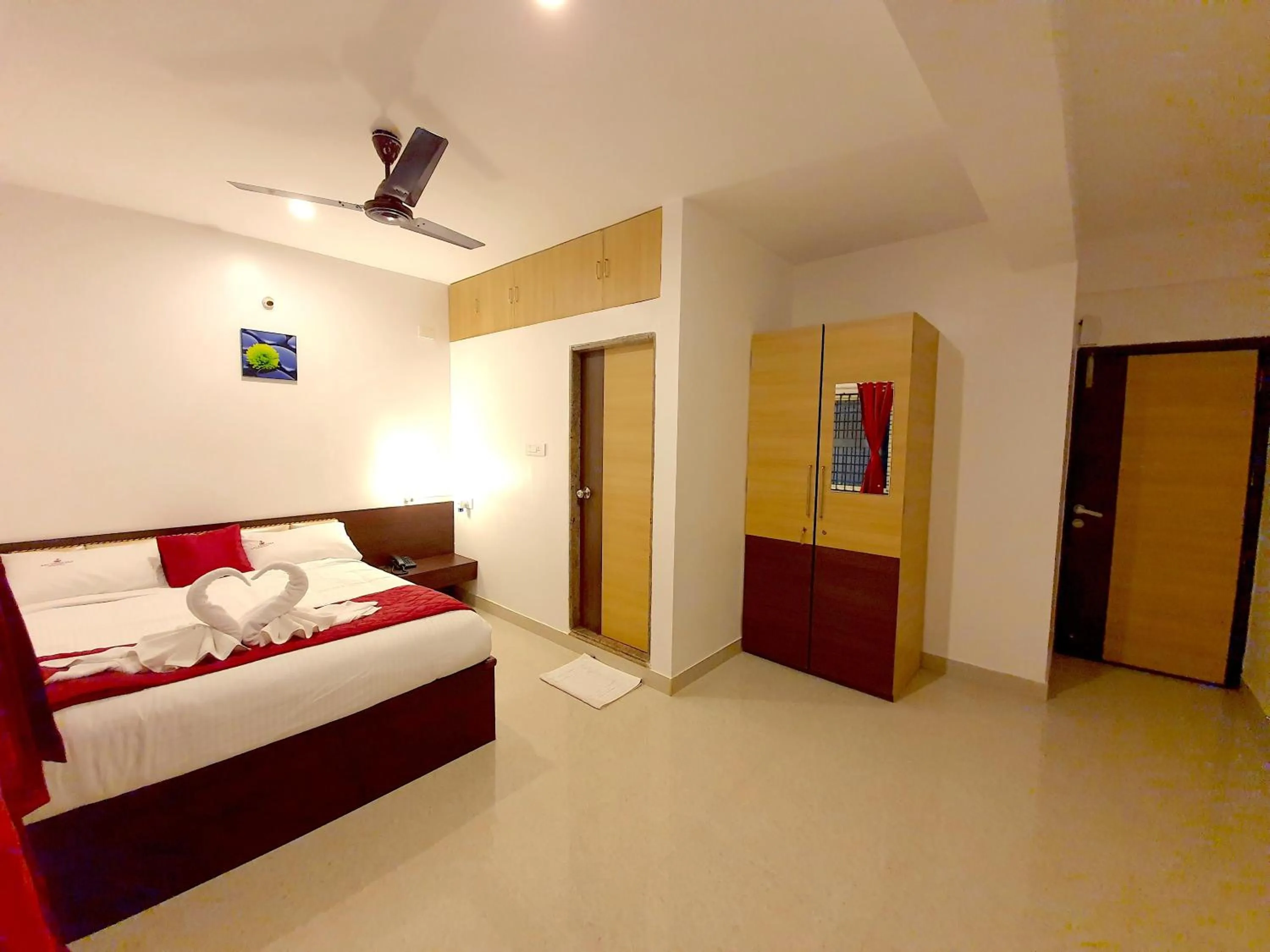 Bed in Sai Shreyas Residency, Boutique Hotel near Bangalore Airport
