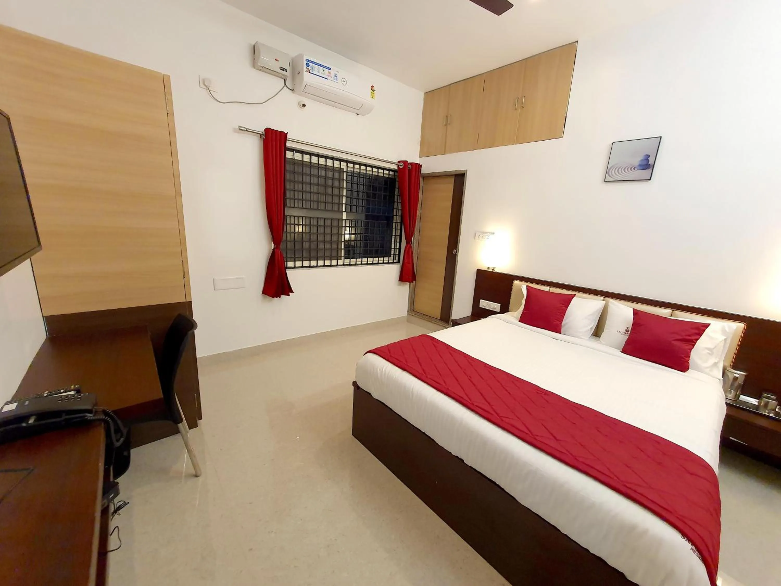 Bed in Sai Shreyas Residency, Boutique Hotel near Bangalore Airport