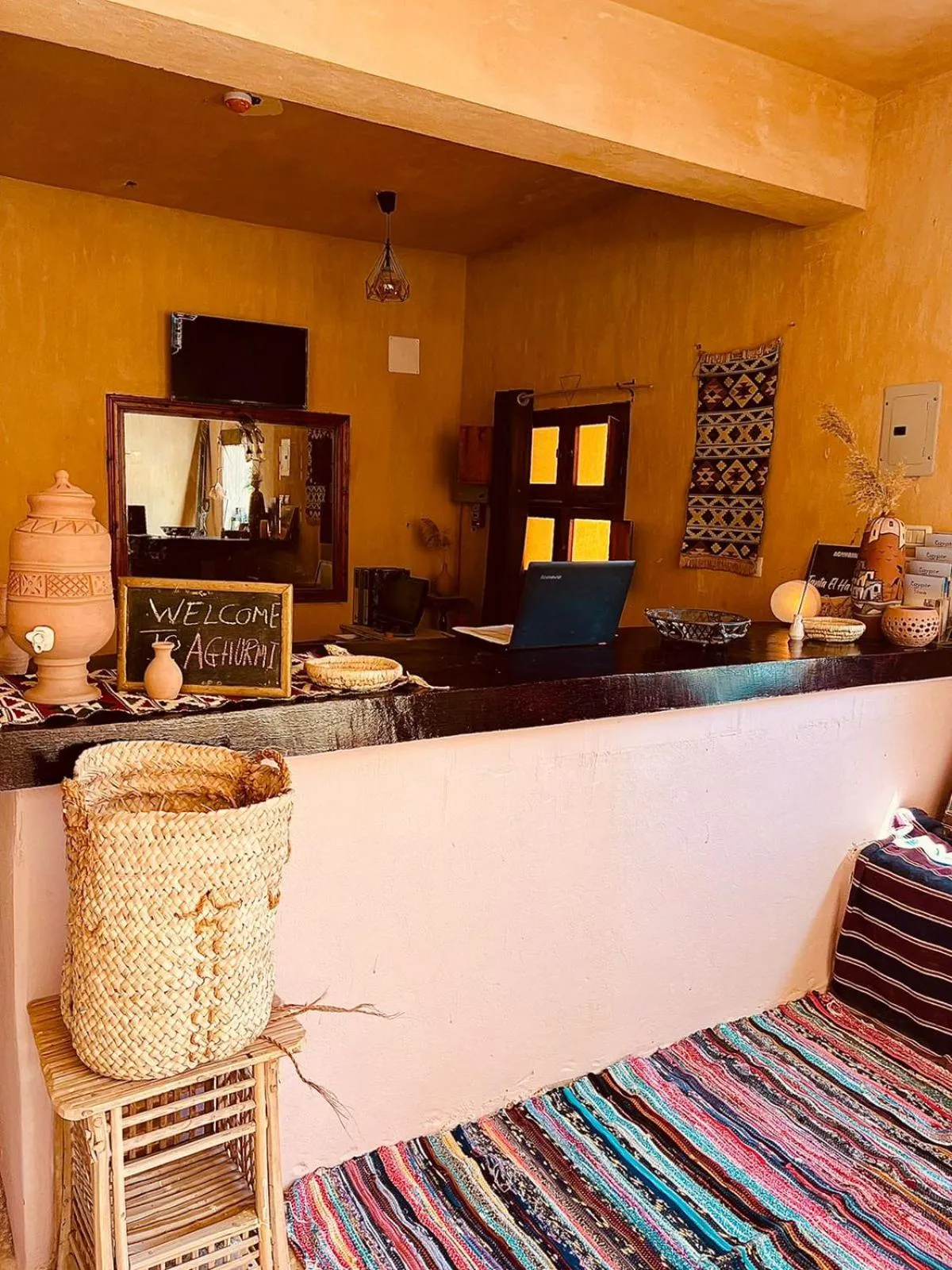 Text overlay in Aghurmi Siwa Ecolodge & Salt Cave
