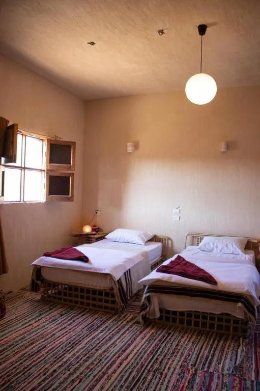 Bed in Aghurmi Siwa Ecolodge & Salt Cave