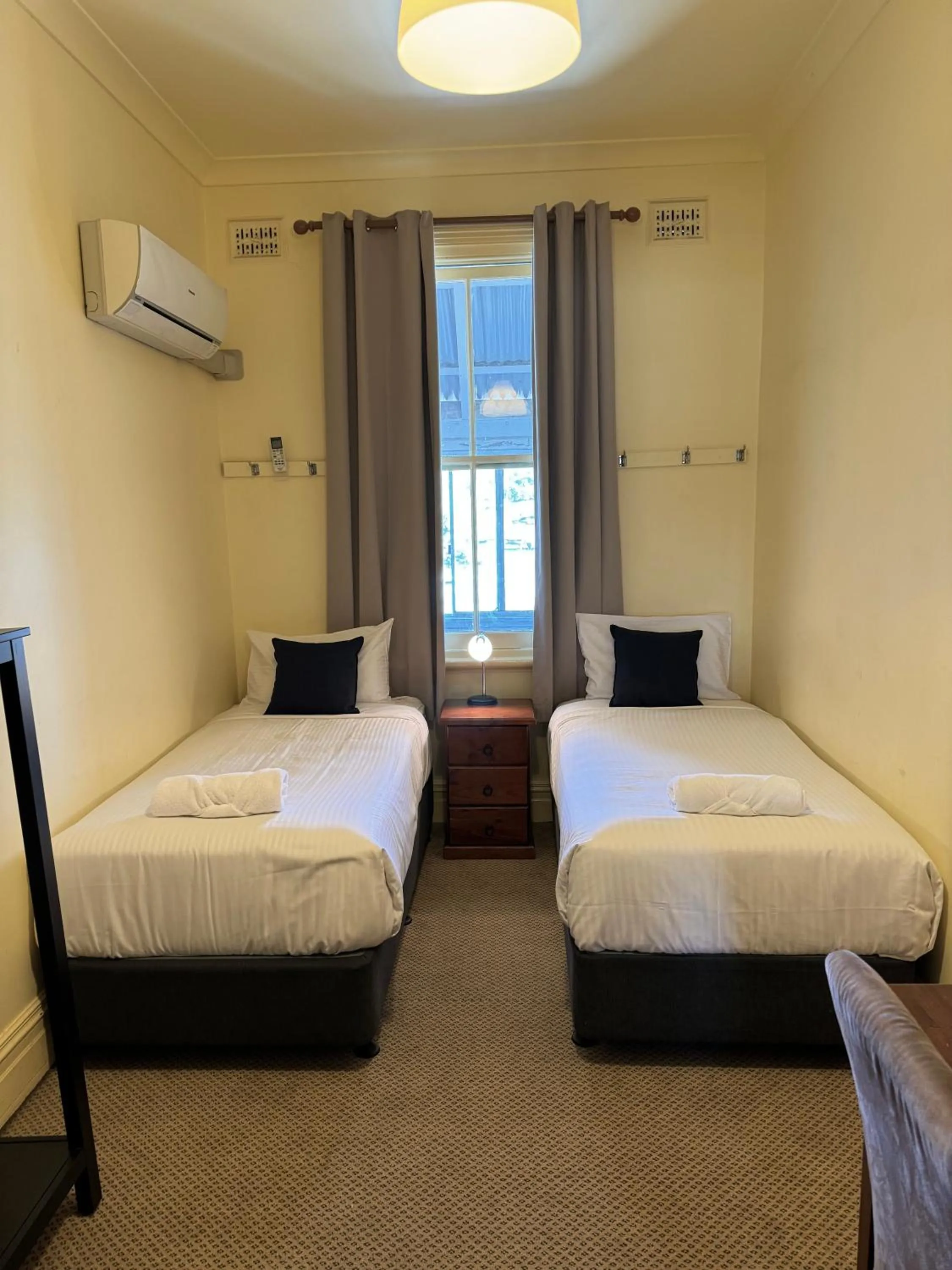 Bed in The Commercial Hotel Wallerawang