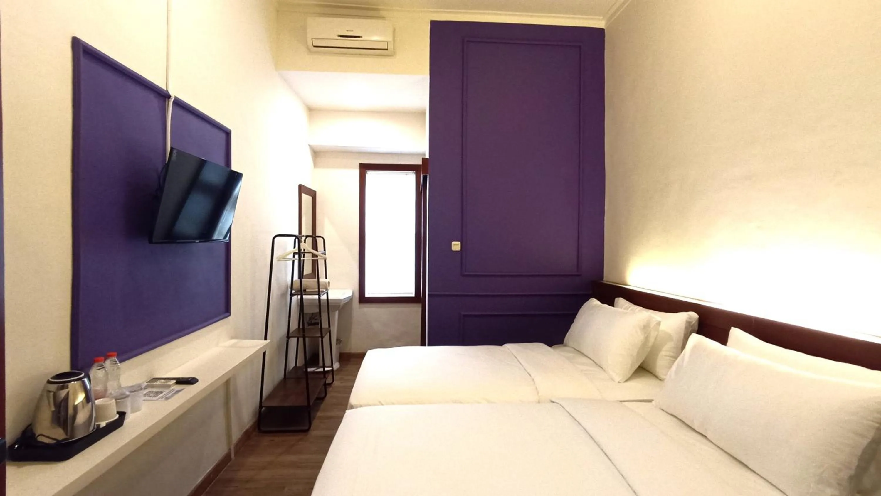 Bed in Riche Heritage Hotel