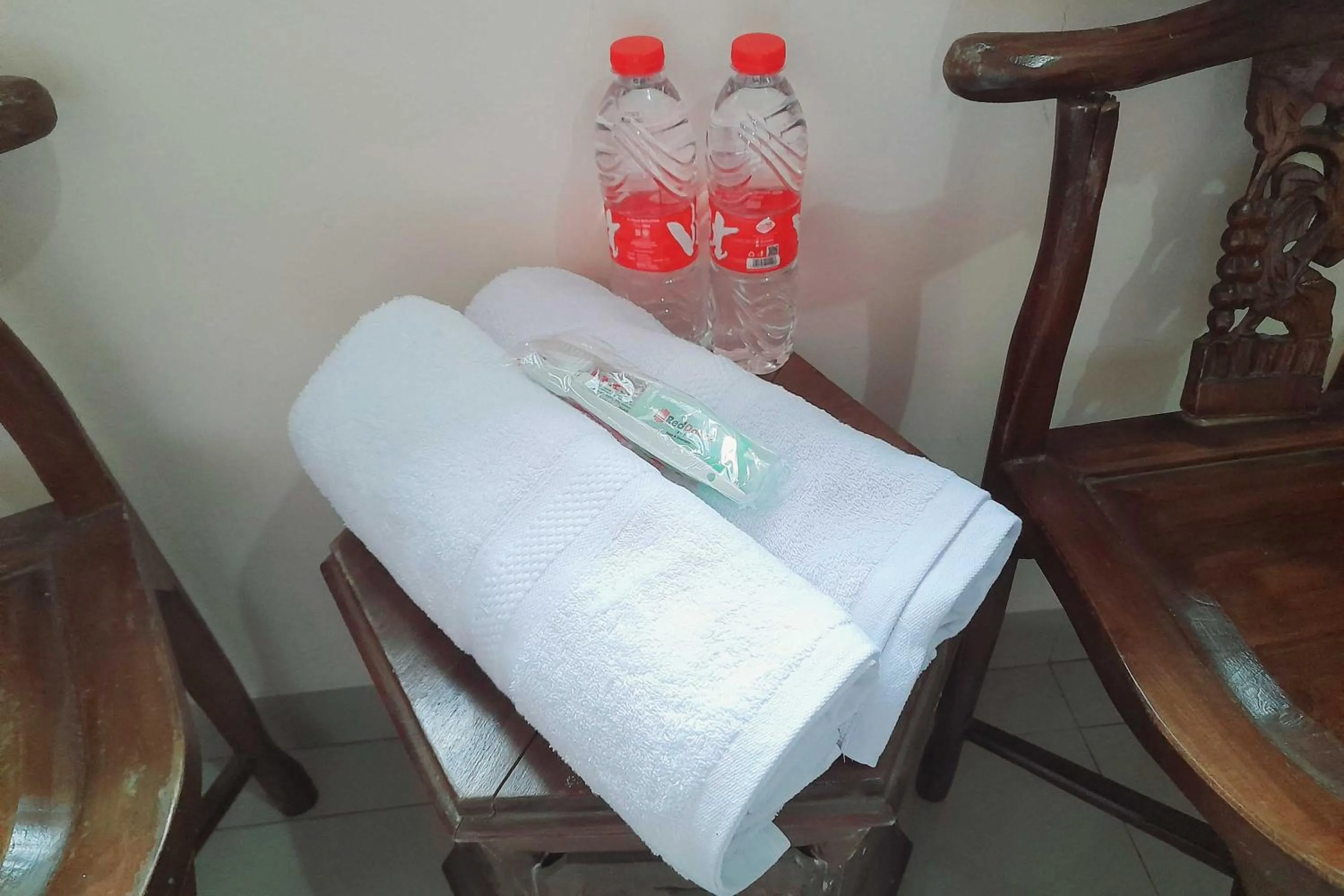 towels in RedDoorz Syariah near Komplek Candi Arjuna Dieng 2