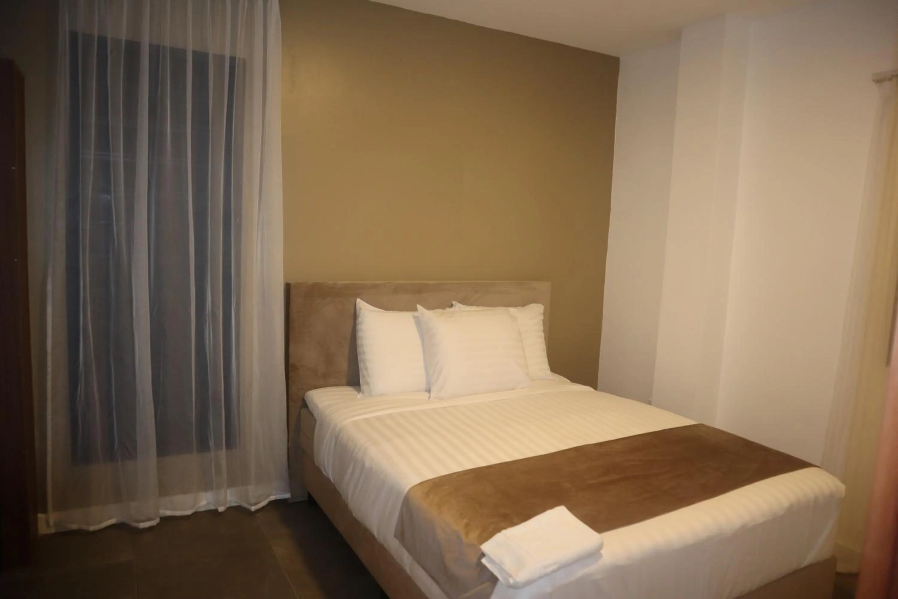 Bed in Empire Apartments SU 2 Marthastraat