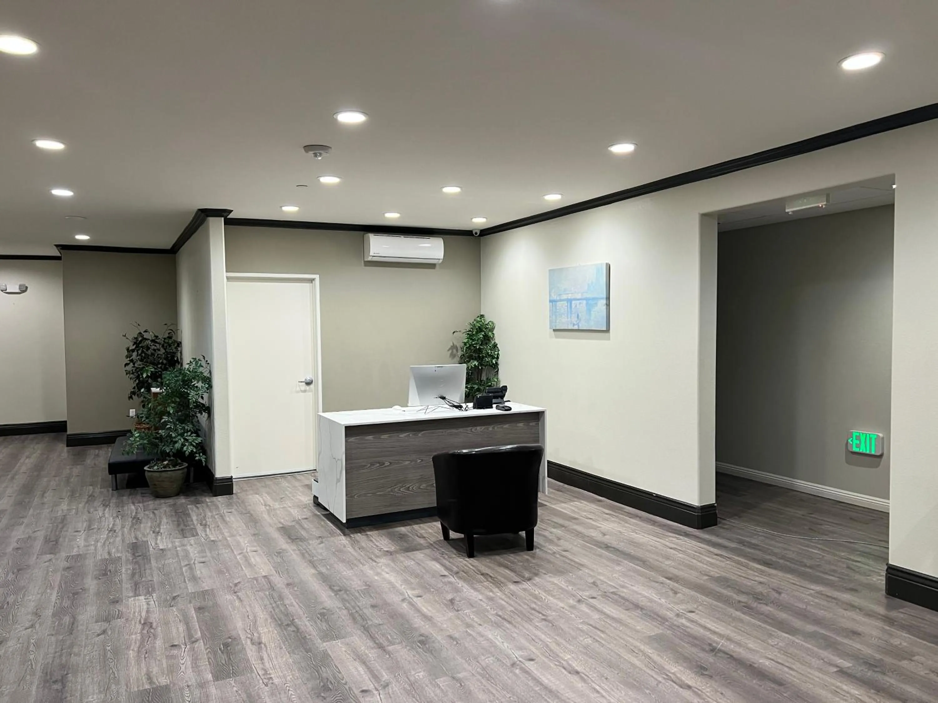 Lobby or reception in ASPIRE INN & SUITES Orange