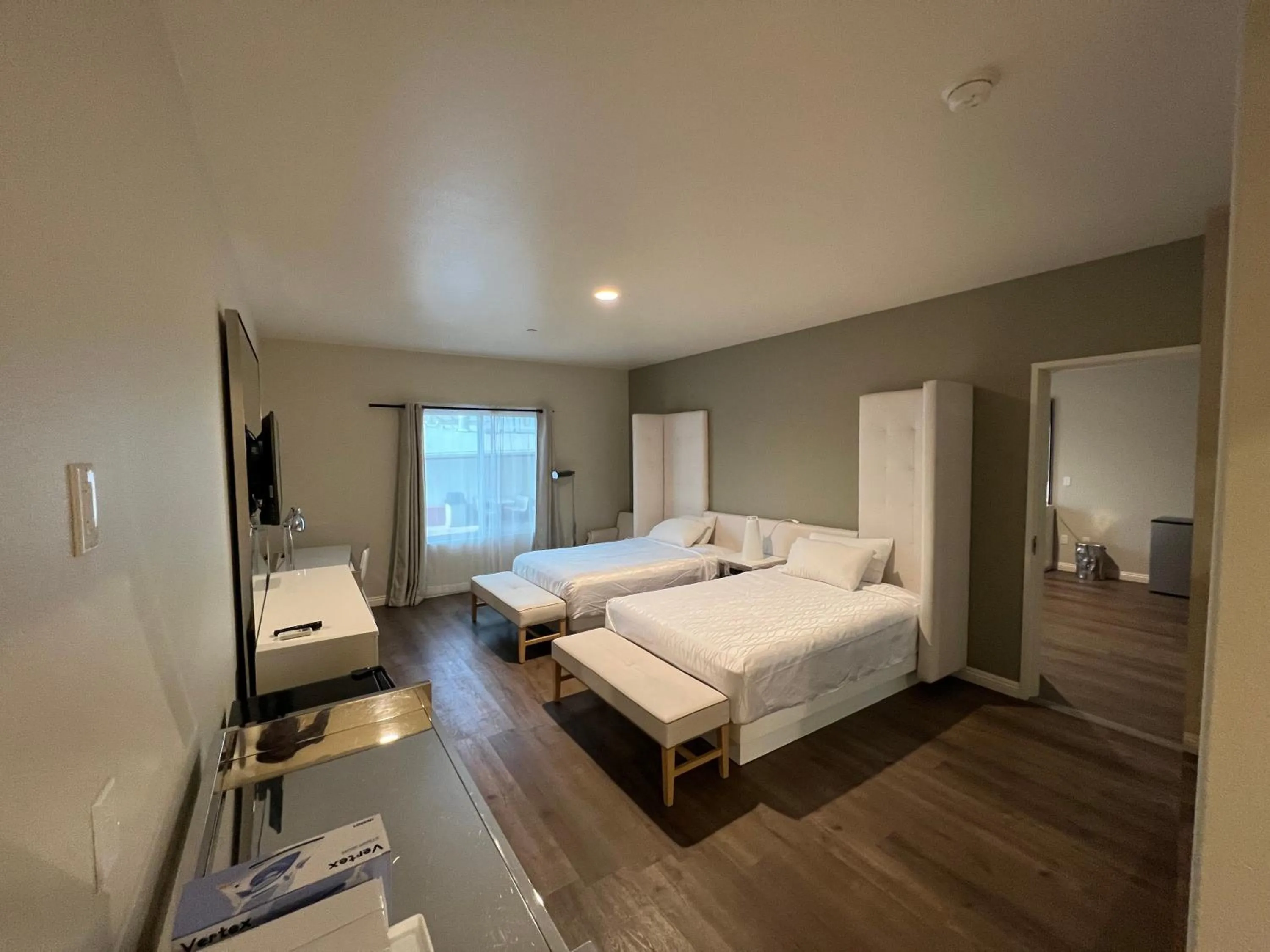 Photo of the whole room, Bed in ASPIRE INN & SUITES Orange