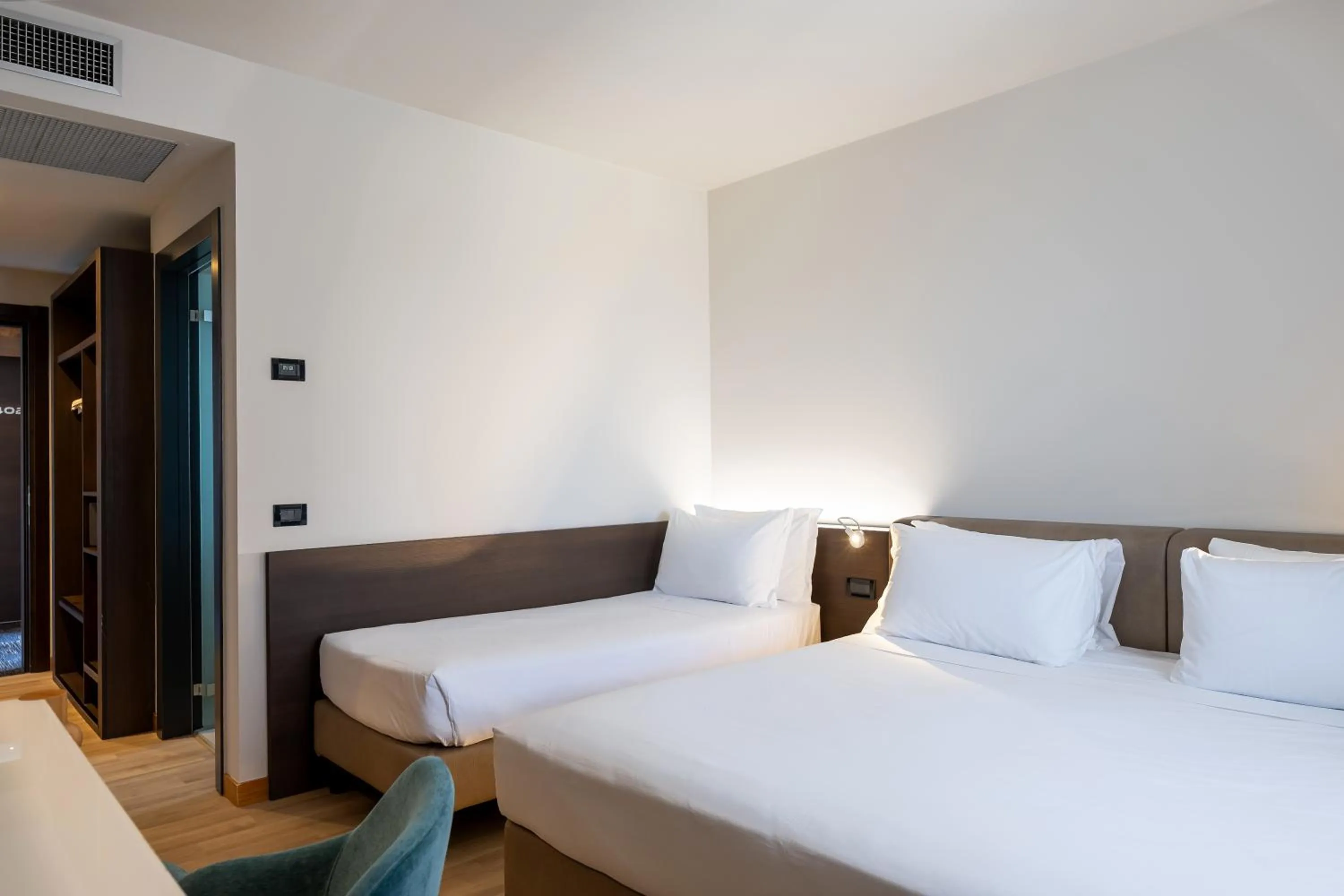 Bed in Elite Hotel & Spa