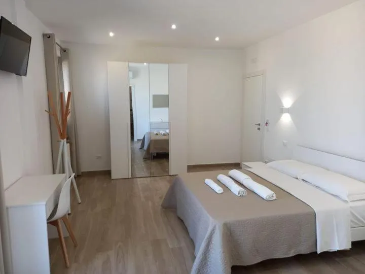 Bed in AMARE Bed & Breakfast