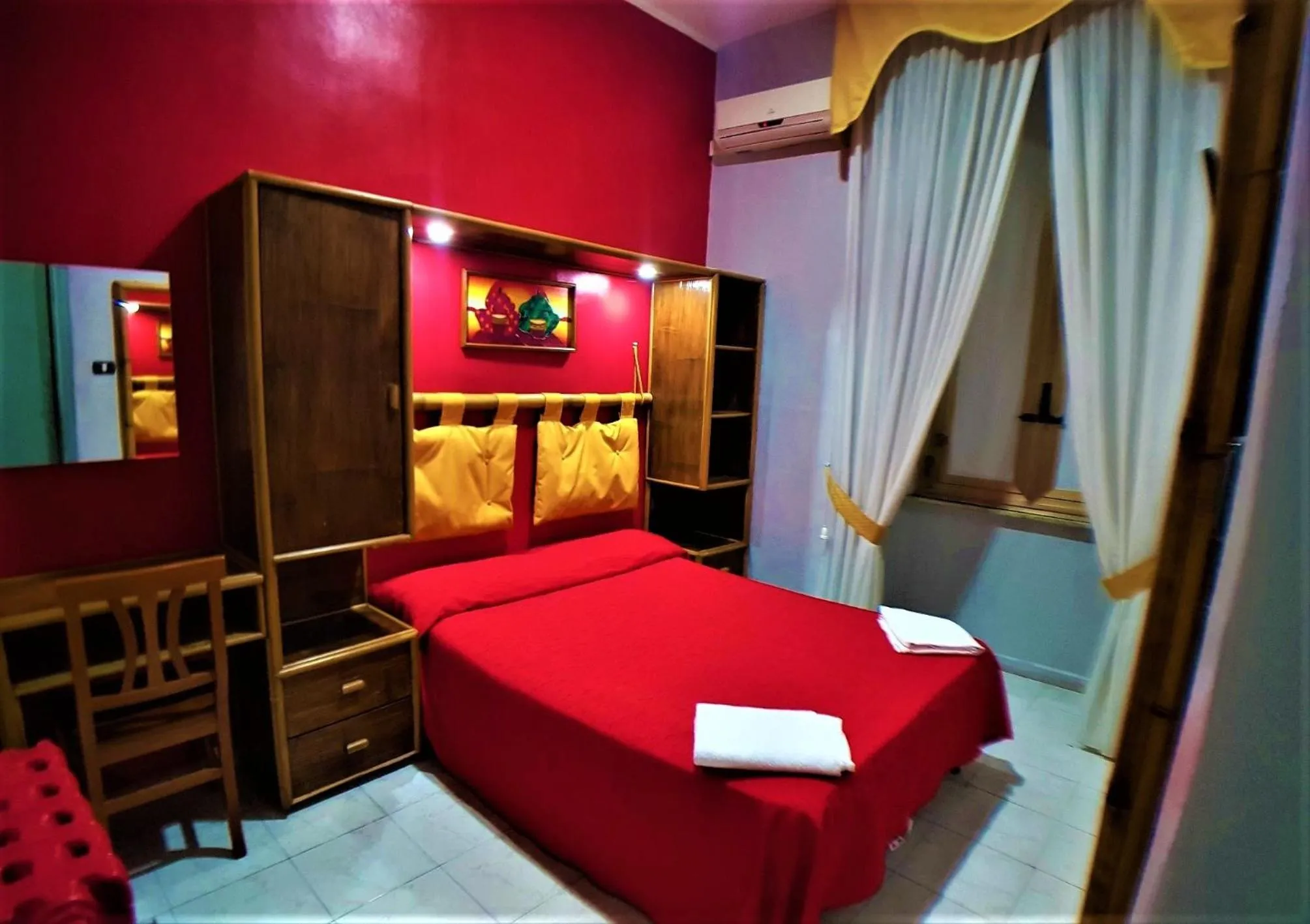 Bed in Hotel Ginevra